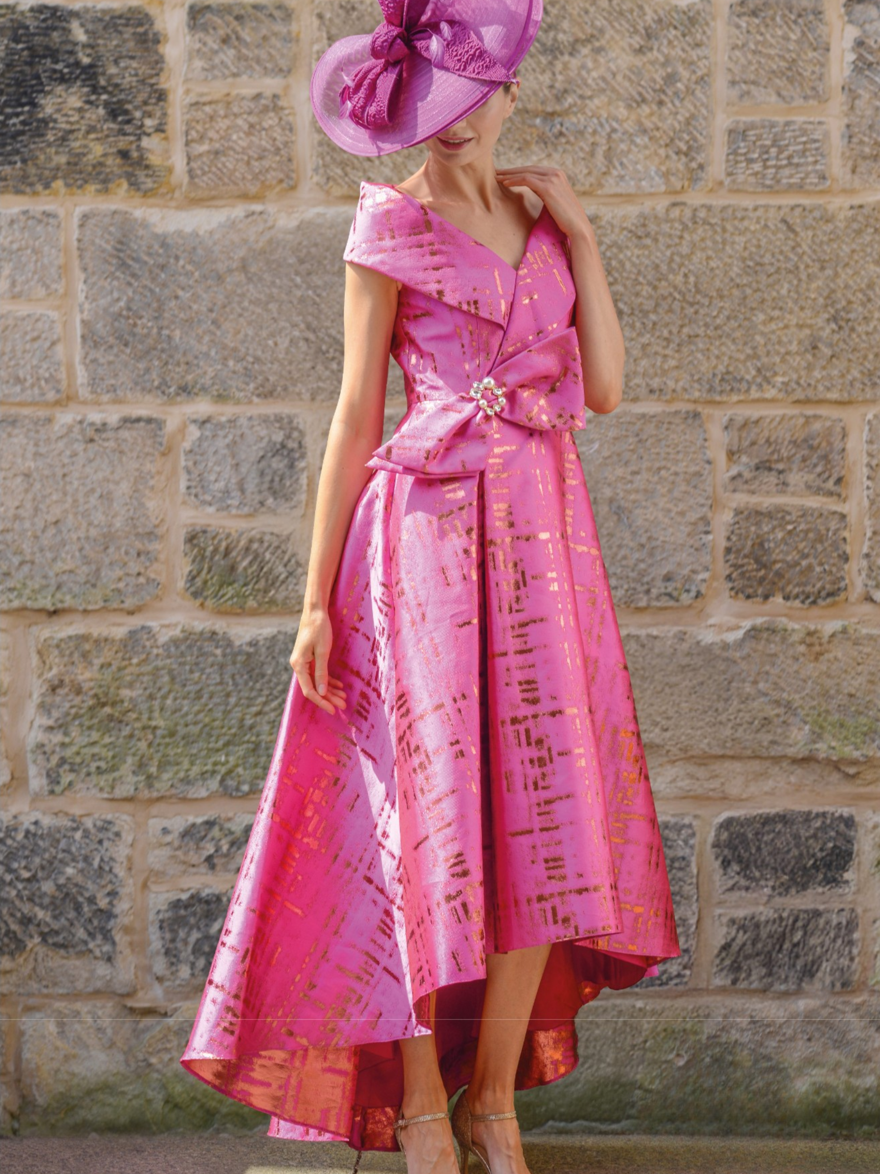 Gabriela Sanchez 5553 Fuchsia Dress off-the-shoulder occasion dress with crossover neckline, fitted bodice and flowing A-line skirt in vibrant fuchsia.