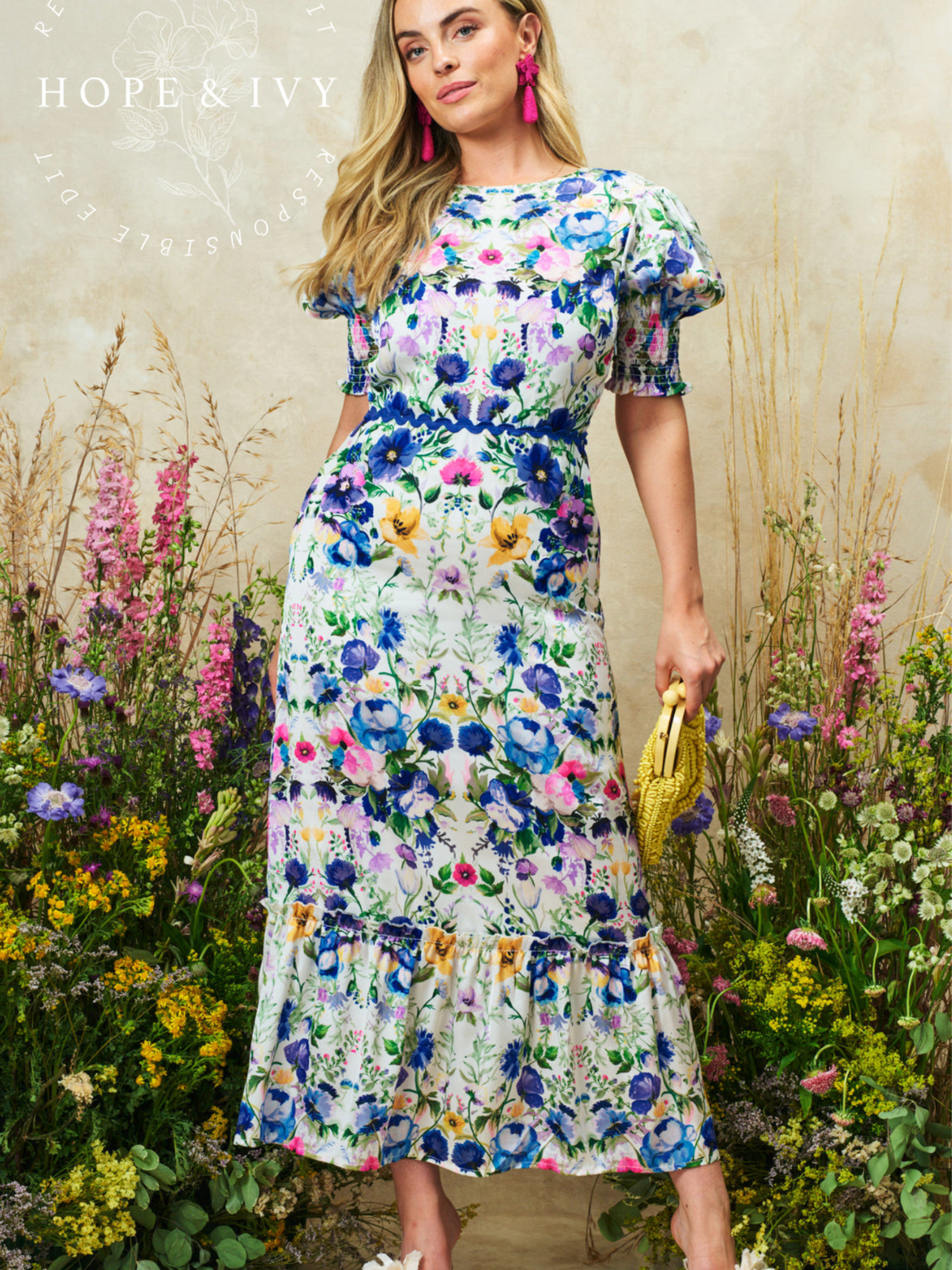 Hope & Ivy Charlotte-Ann White / Blue Multi Dress with floral print, puff sleeves, bow back and flowing silhouette.