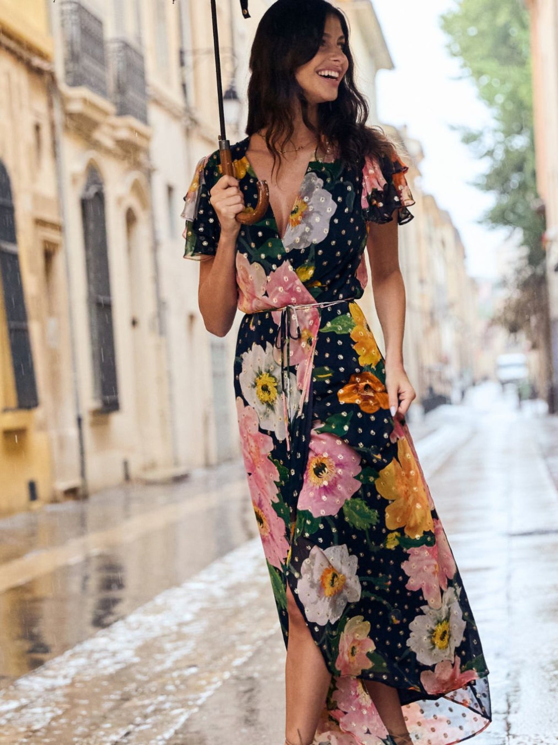 Hope & Ivy Marlene Floral Dress – floral wrap maxi dress with pink, orange and ivory blooms, gold Lurex detail, flutter sleeves and tie waist. Perfect for weddings, garden parties and summer events.