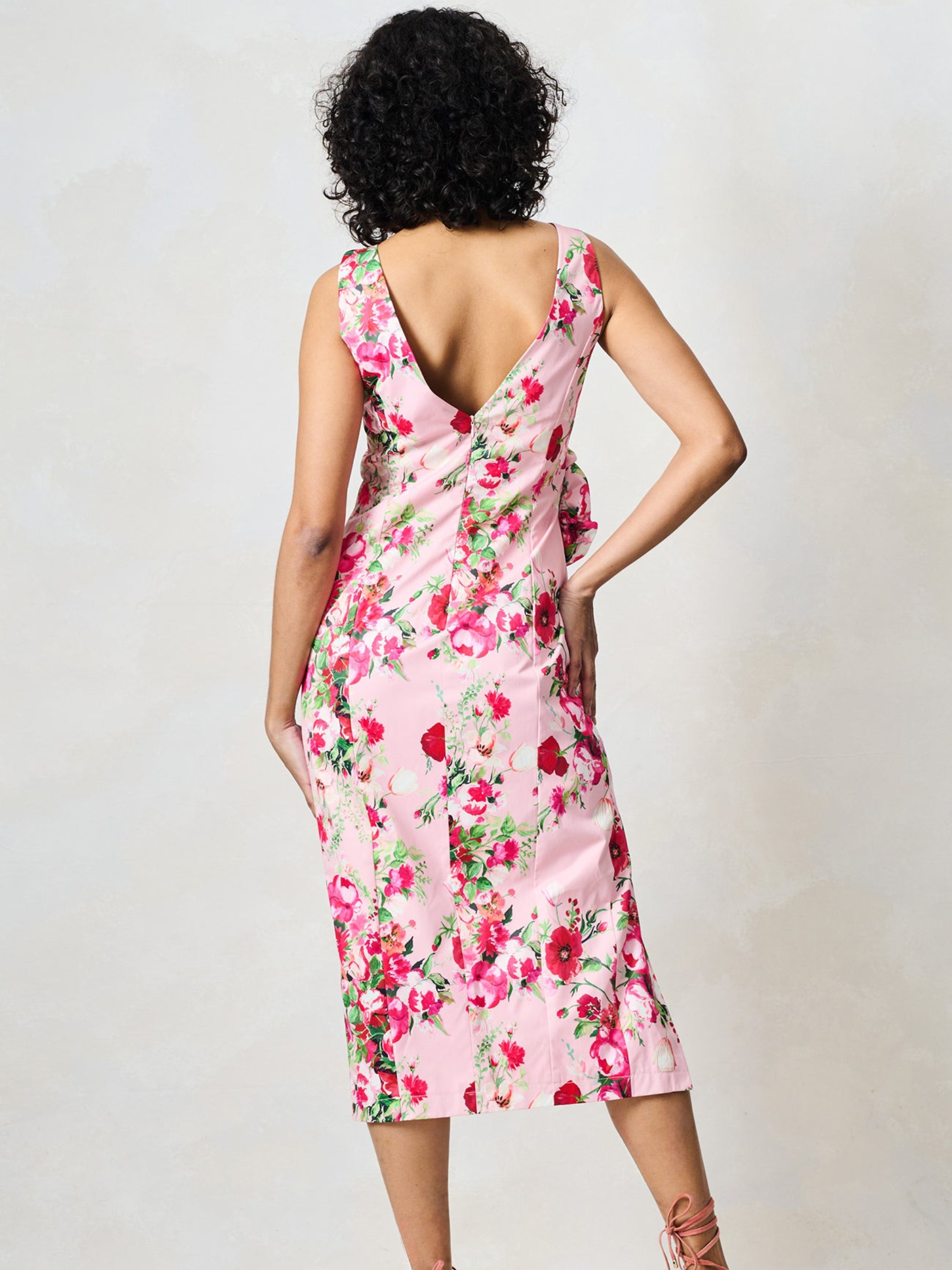 Hope & Ivy Megan Pink Floral Dress with round neckline, sleeveless design, floral waist detail and fitted pencil silhouette with thigh split.