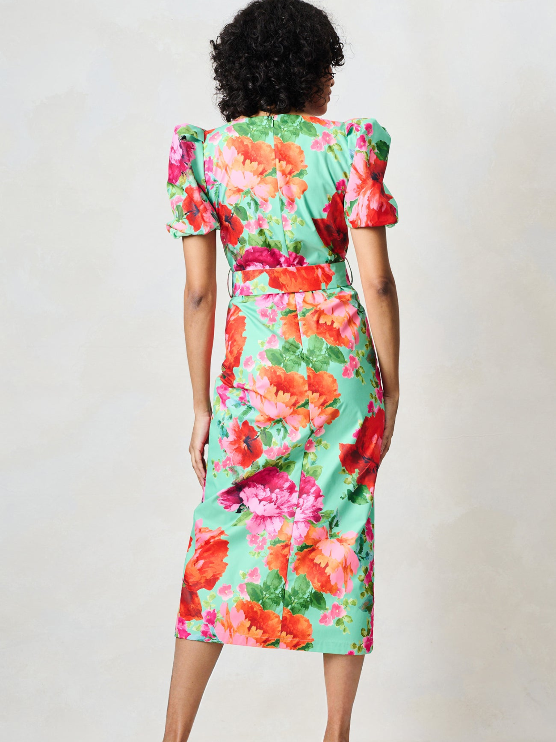 Hope & Ivy Rowena Green Floral Dress with sweetheart neckline, puff sleeves, belted waist and fitted pencil silhouette.