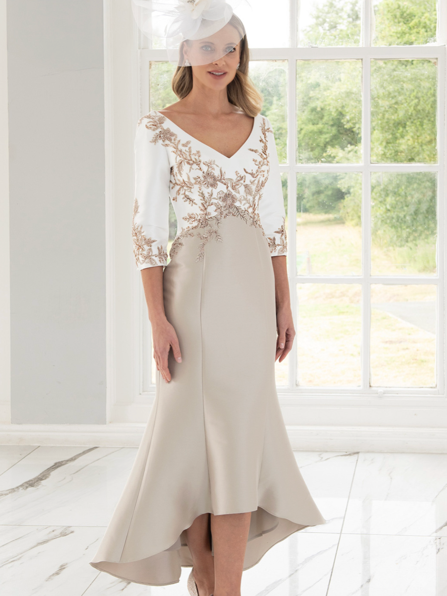 Irresistible IR8812TJ Ivory/Cappuccino Dress featuring an embroidered ivory bodice, V-neckline, three-quarter sleeves and a flowing high-low skirt - a refined occasion dress perfect for weddings and elegant events.
