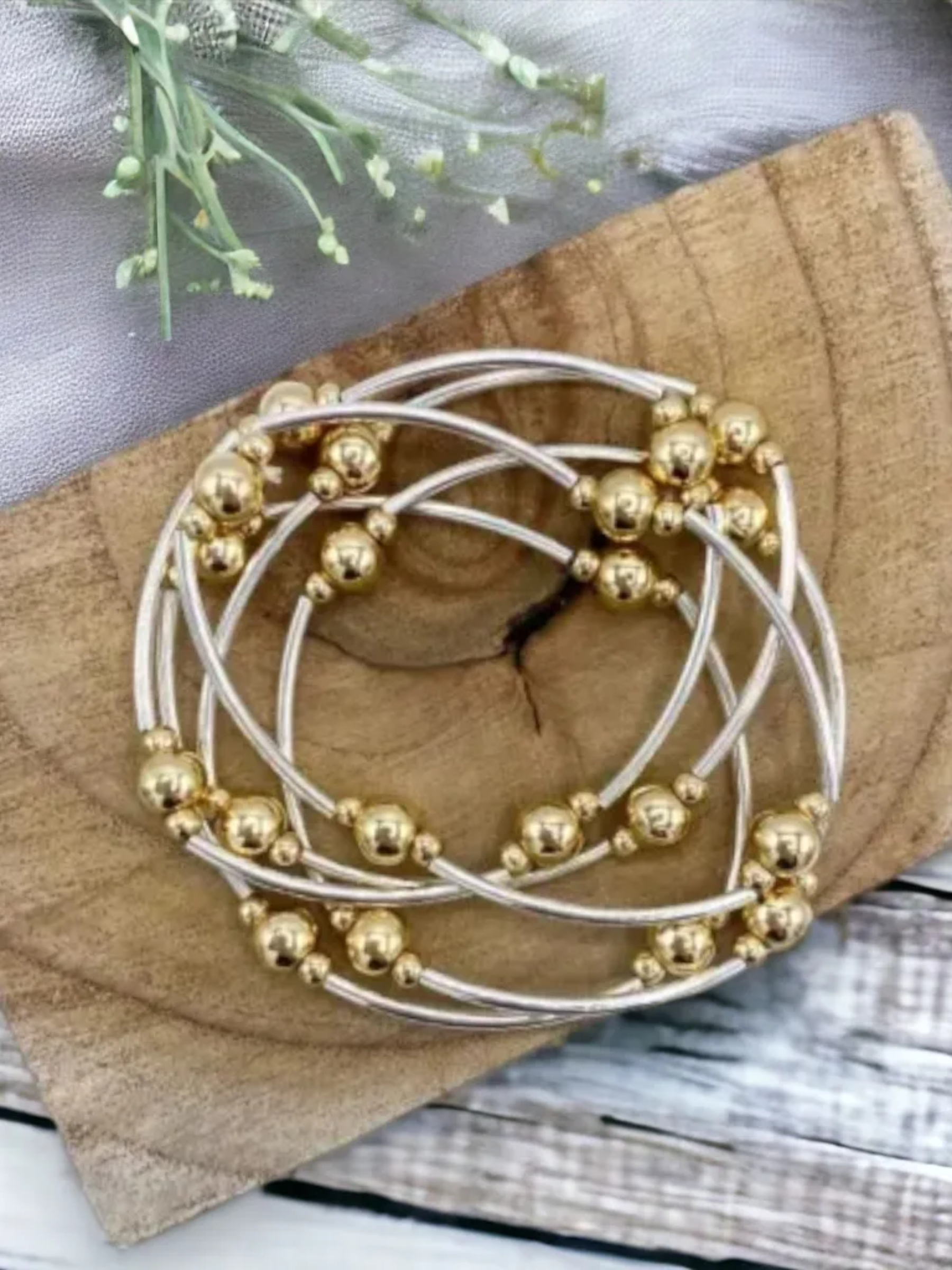 Jess & Lou BR268S multi bangle with gold bead detail in silver and gold tones – women’s statement bracelet for versatile day-to-night styling.