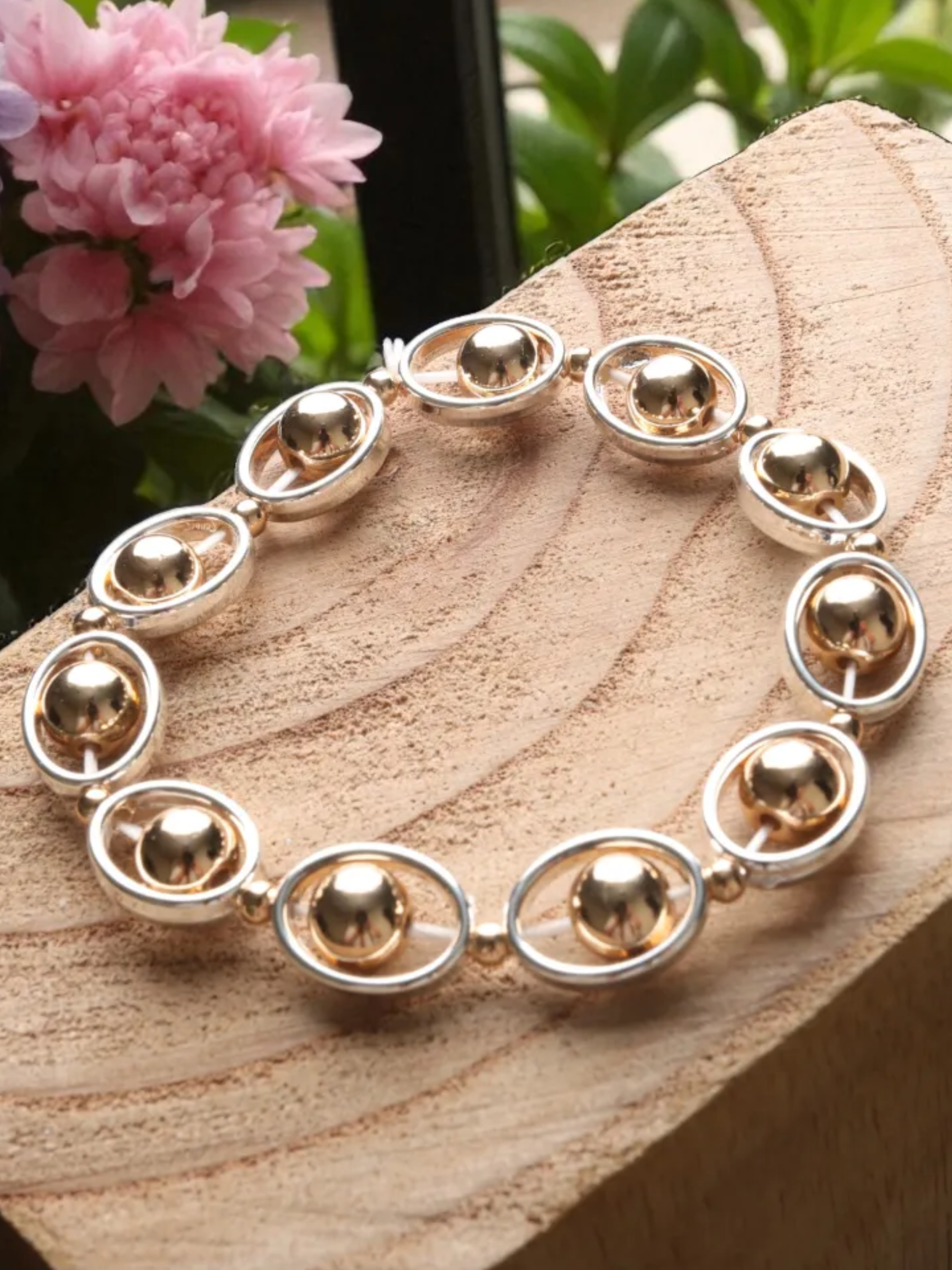 Jess & Lou BR242M mixed orbit beads on stretch bracelet in silver and gold tones – women’s statement fashion bracelet for everyday and evening wear.