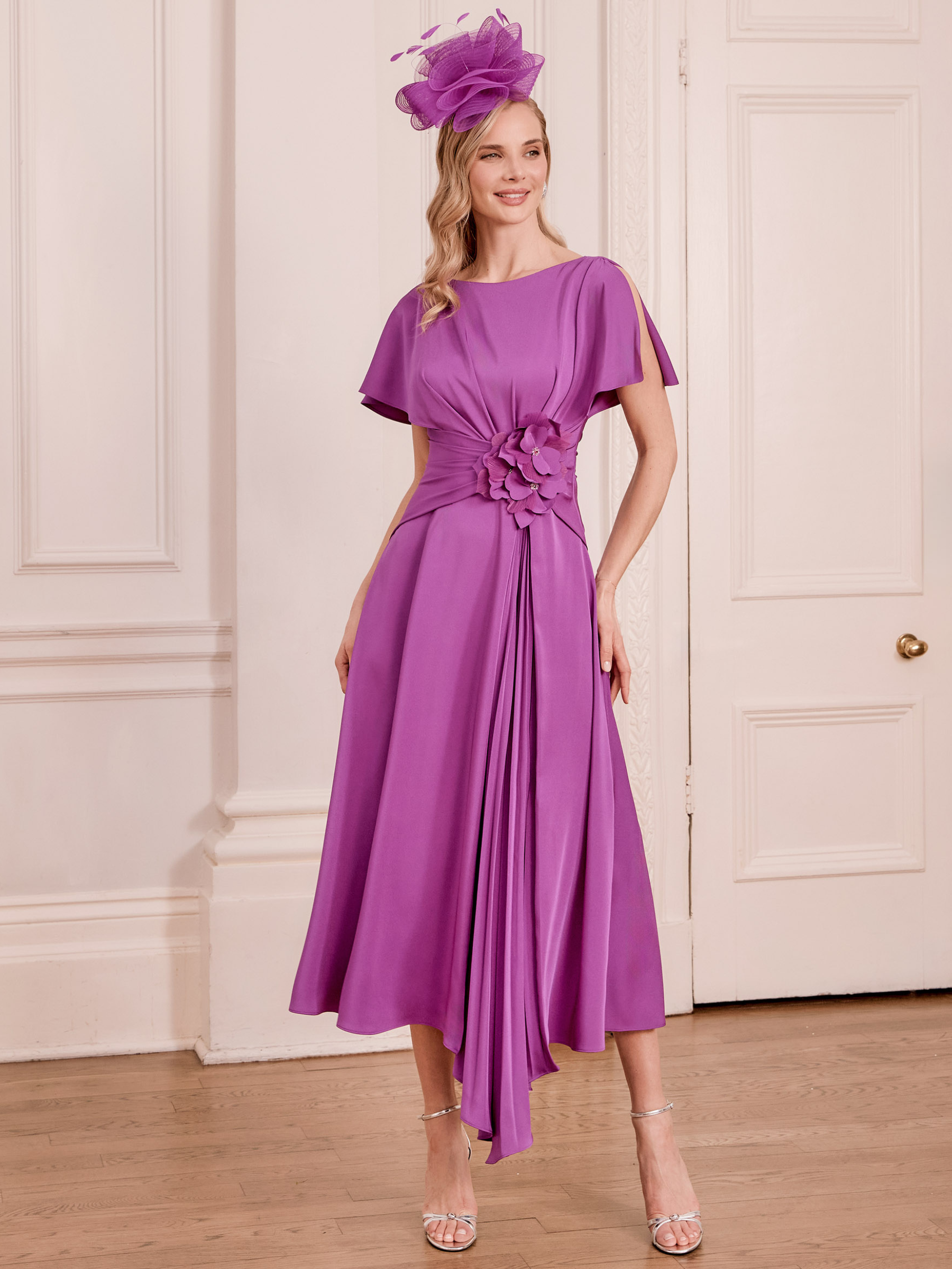 John Charles 66782A Violet Dress satin back crepe midi dress with draped bodice, flutter sleeves, 3D floral waist detail and pleated A-line skirt