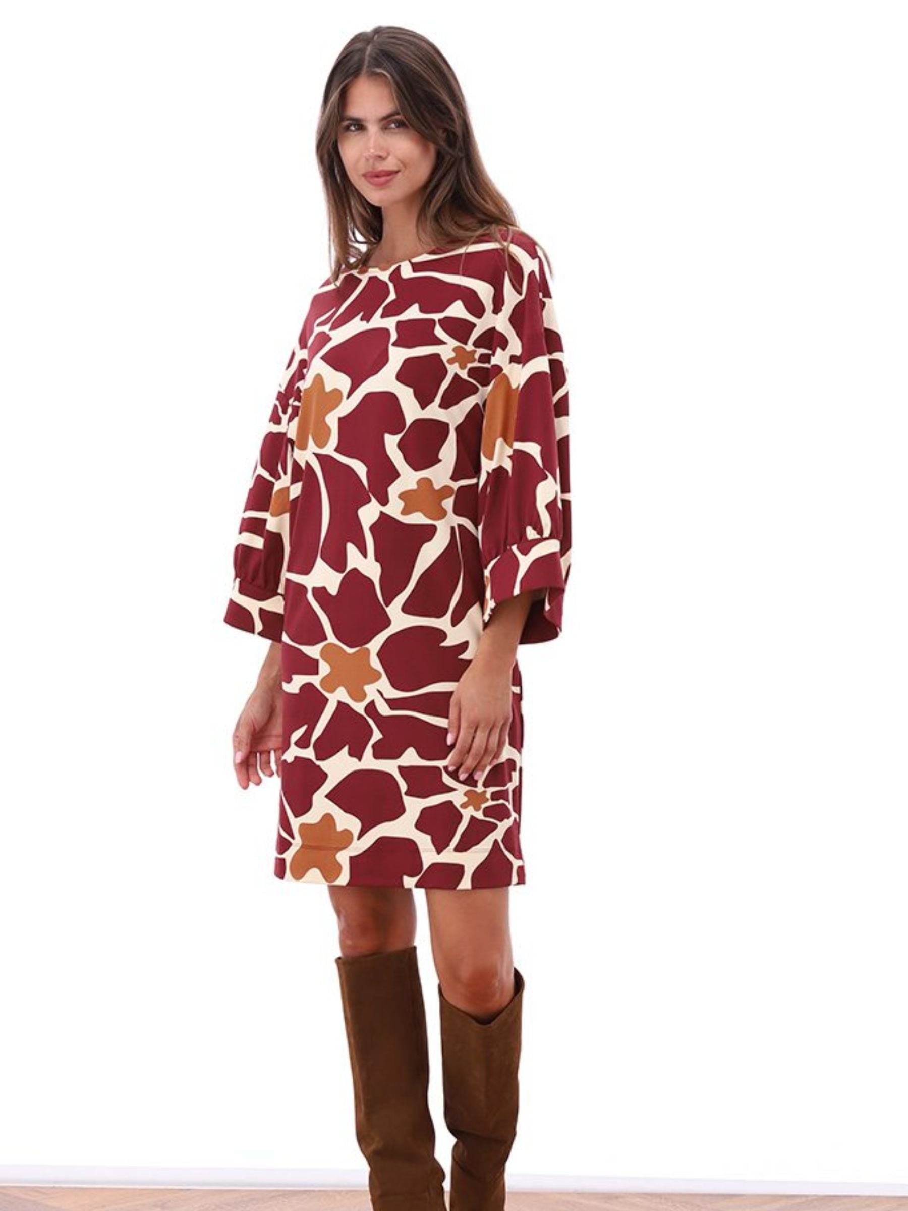 Women’s shift dress with burgundy and caramel abstract floral print, three-quarter balloon sleeves, and relaxed fit for effortless day-to-evening style.