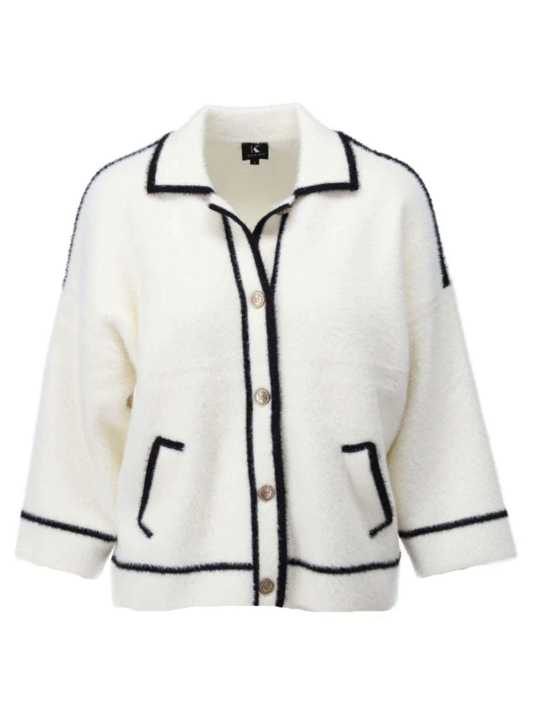 K Design B846 women’s black and white cardigan with contrast trim, gold-tone buttons, and front pockets - timeless knitwear for layering in autumn-winter.