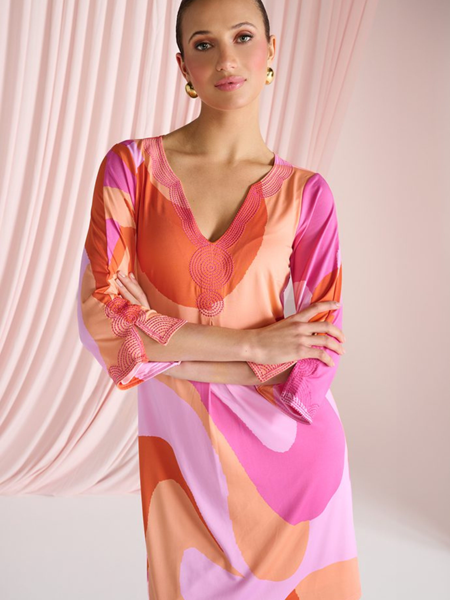 K Design C309 Dress with abstract print, decorative neckline detail and three-quarter sleeves.