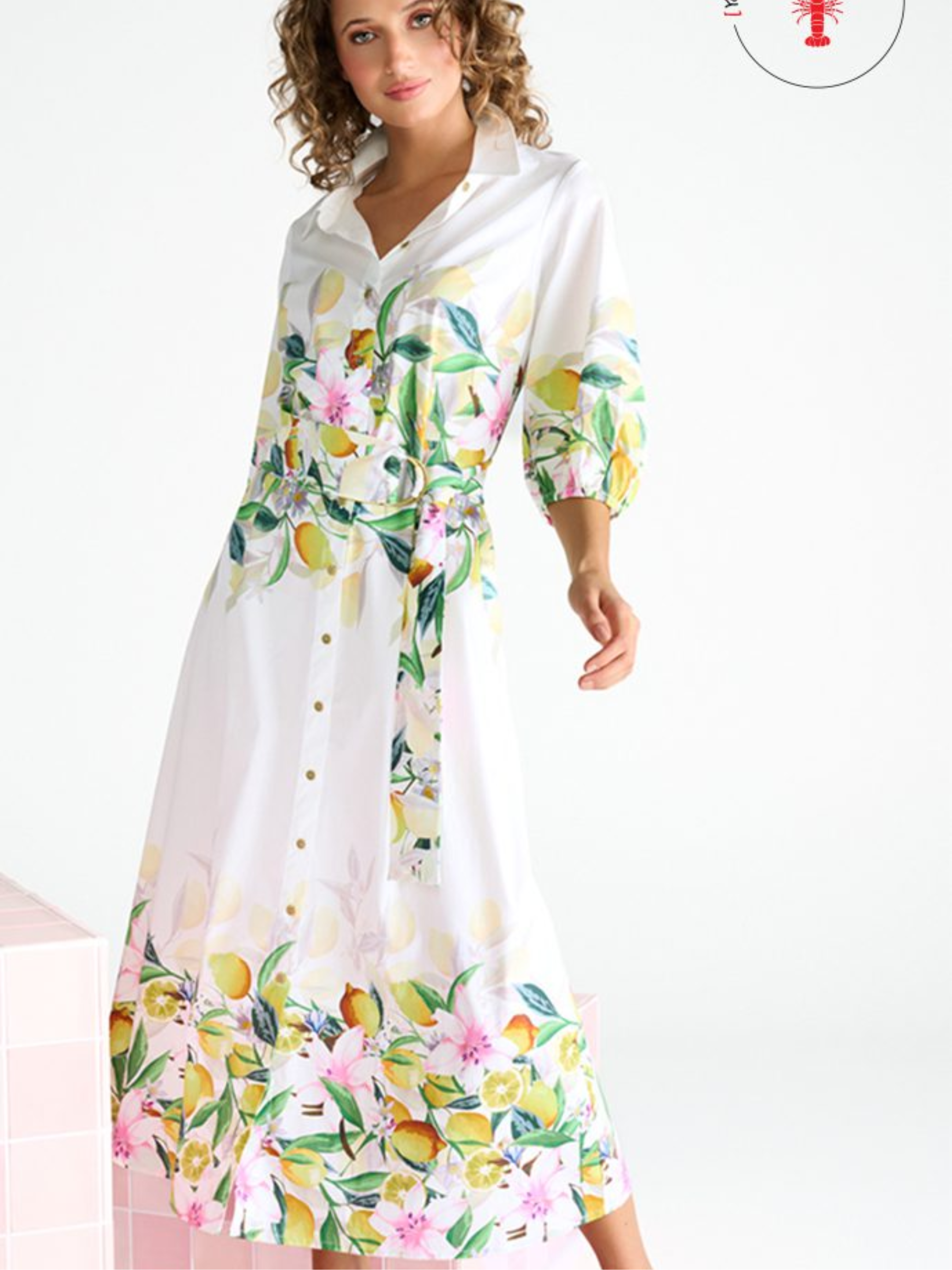 K Design C352L Dress full-length botanical print shirt dress with collar, button-through front, waist belt with buckle and border hem detail.