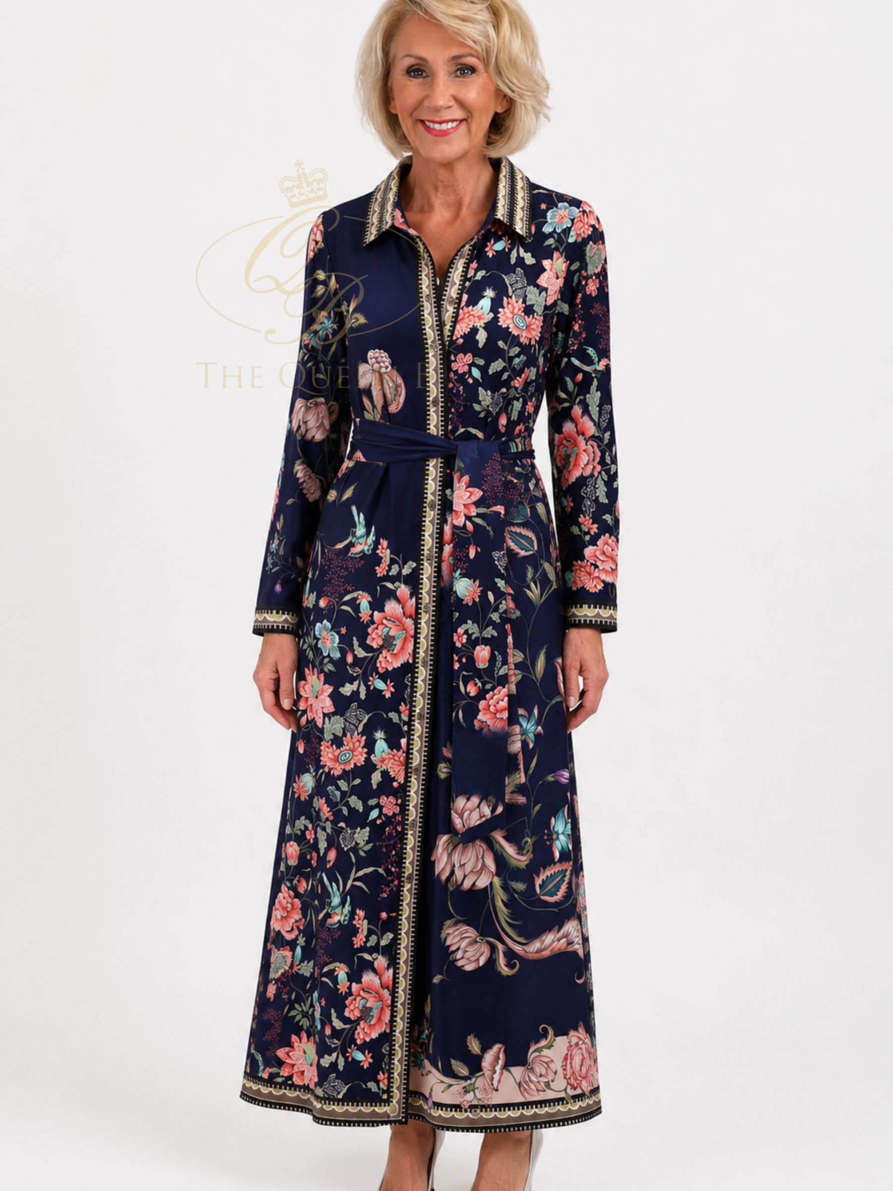 K Design D603 Maxi Dress with floral print, collared neckline, button-through front, long sleeves, self-tie waist belt and border detailing.