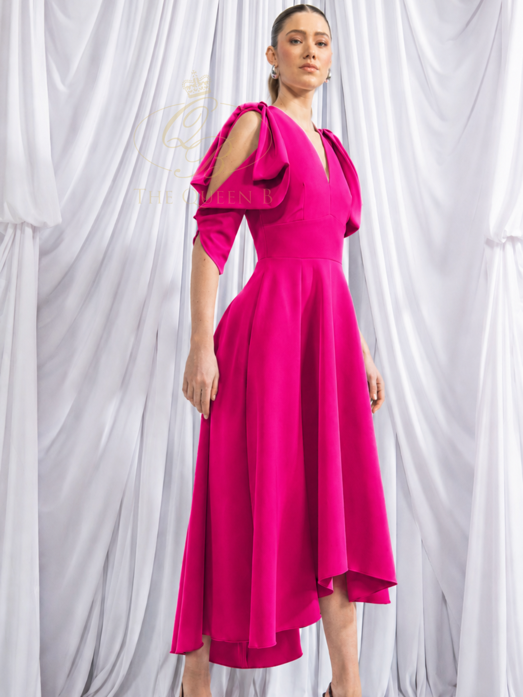 Kevan Jon Serena Bright Pink Sleeve Flare Dress with V-neckline, sculpted sleeves, open back and softly flared skirt.