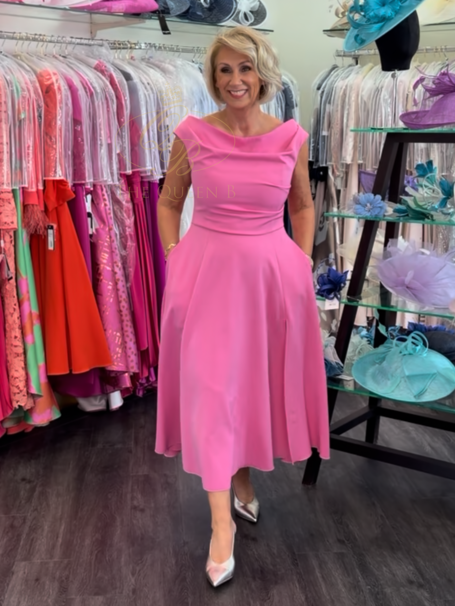 Kevan Jon Sydney Candy Pink Flare Dress Cape in Delauney Scuba with a fitted bodice, flared midi skirt and matching draped shoulder cape.