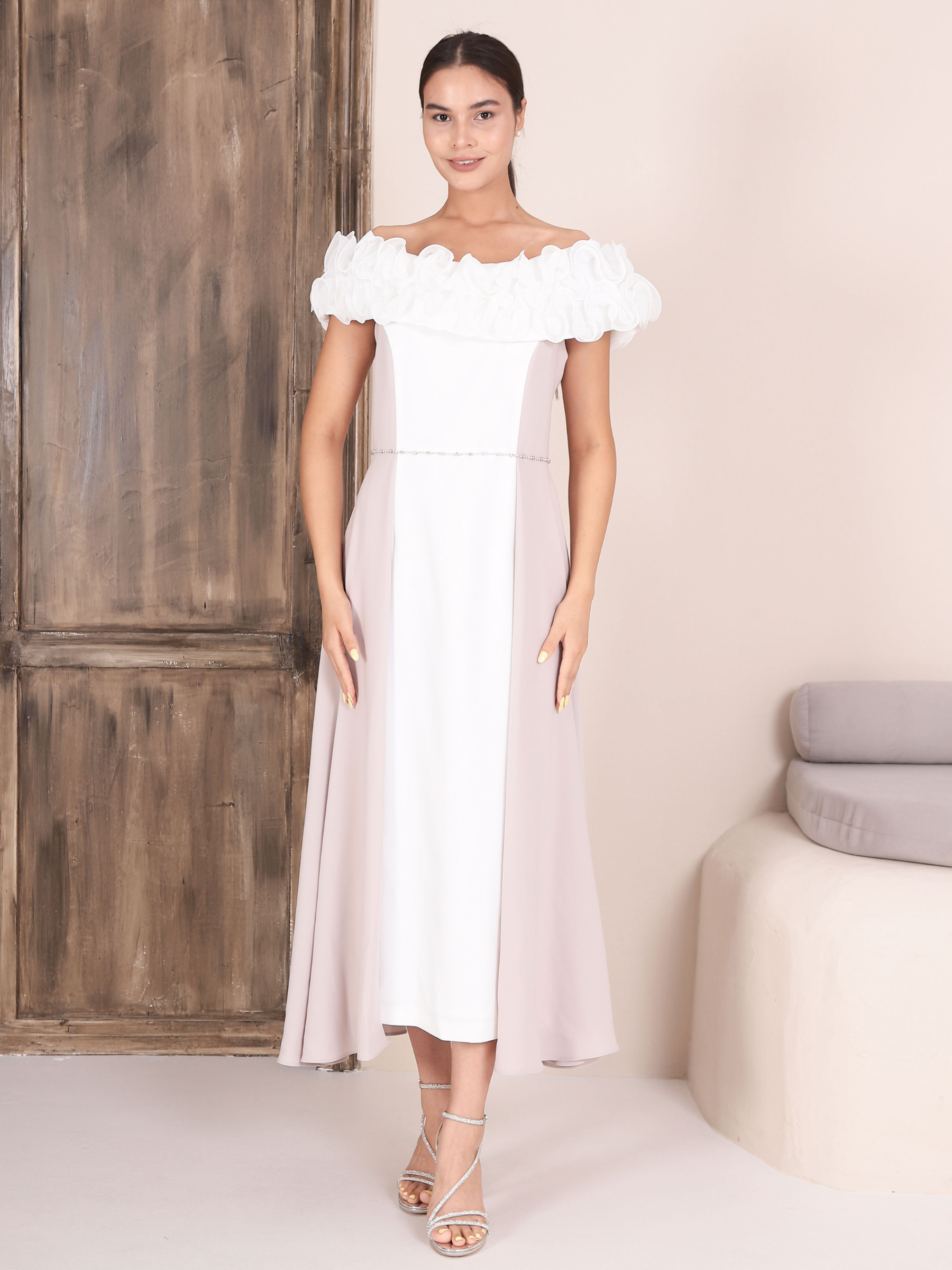 Lizabella 2301 - 40 oyster off-the-shoulder occasion dress with floral neckline and elegant flowing silhouette.