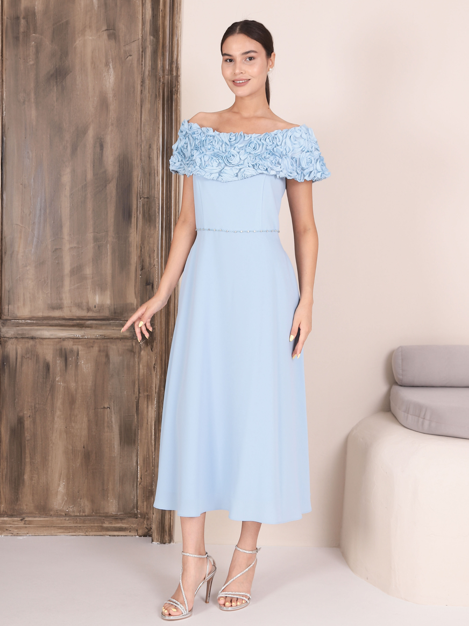 Lizabella 2302 – 40 Vista Dress with off-the-shoulder Bardot neckline, floral appliqué detail and elegant flared silhouette.