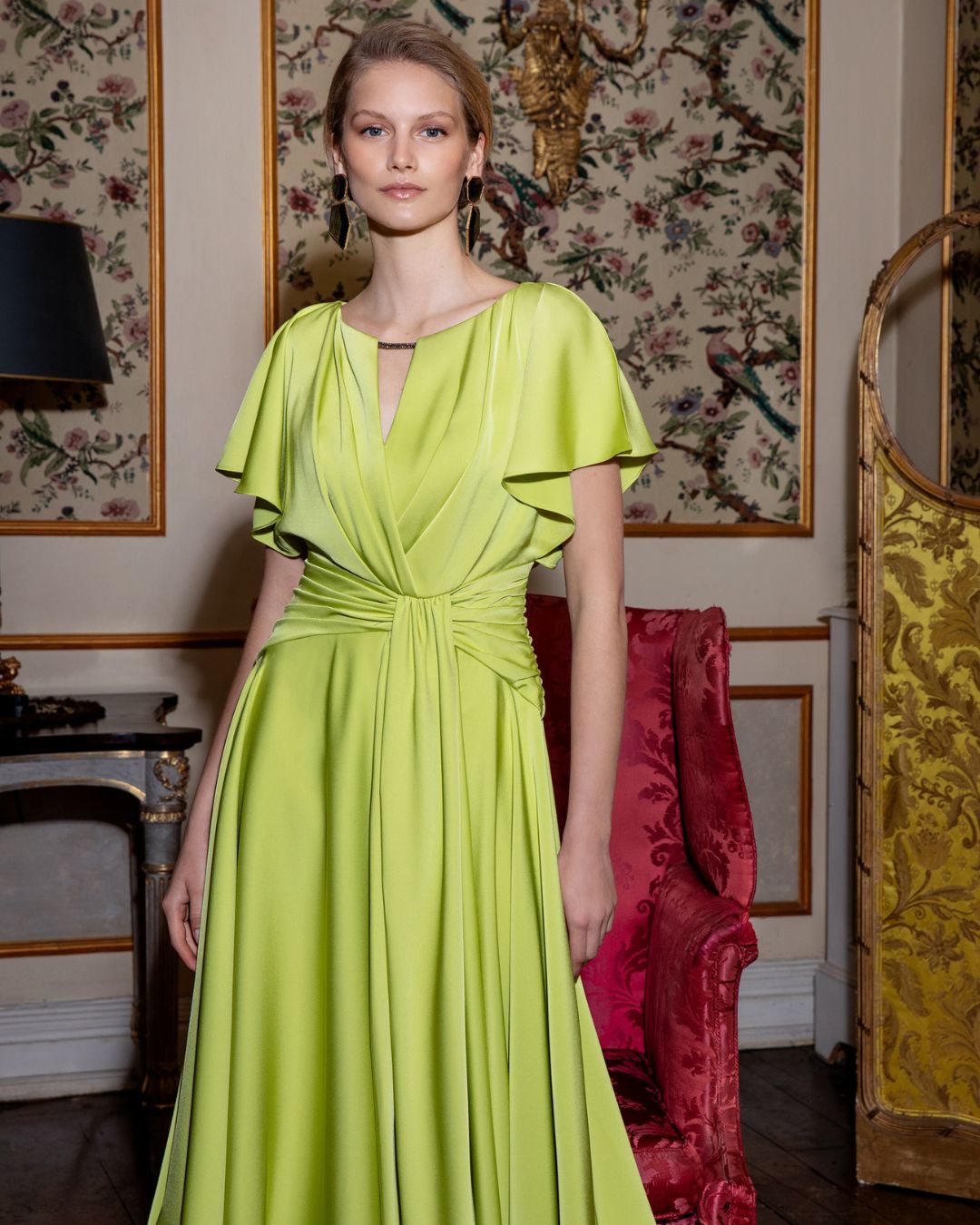 Maisonel ME3003 Lime Dress – women’s satin occasion dress in vibrant lime with flutter sleeves, gathered waist detail, and asymmetric hemline. Perfect for weddings and formal events.