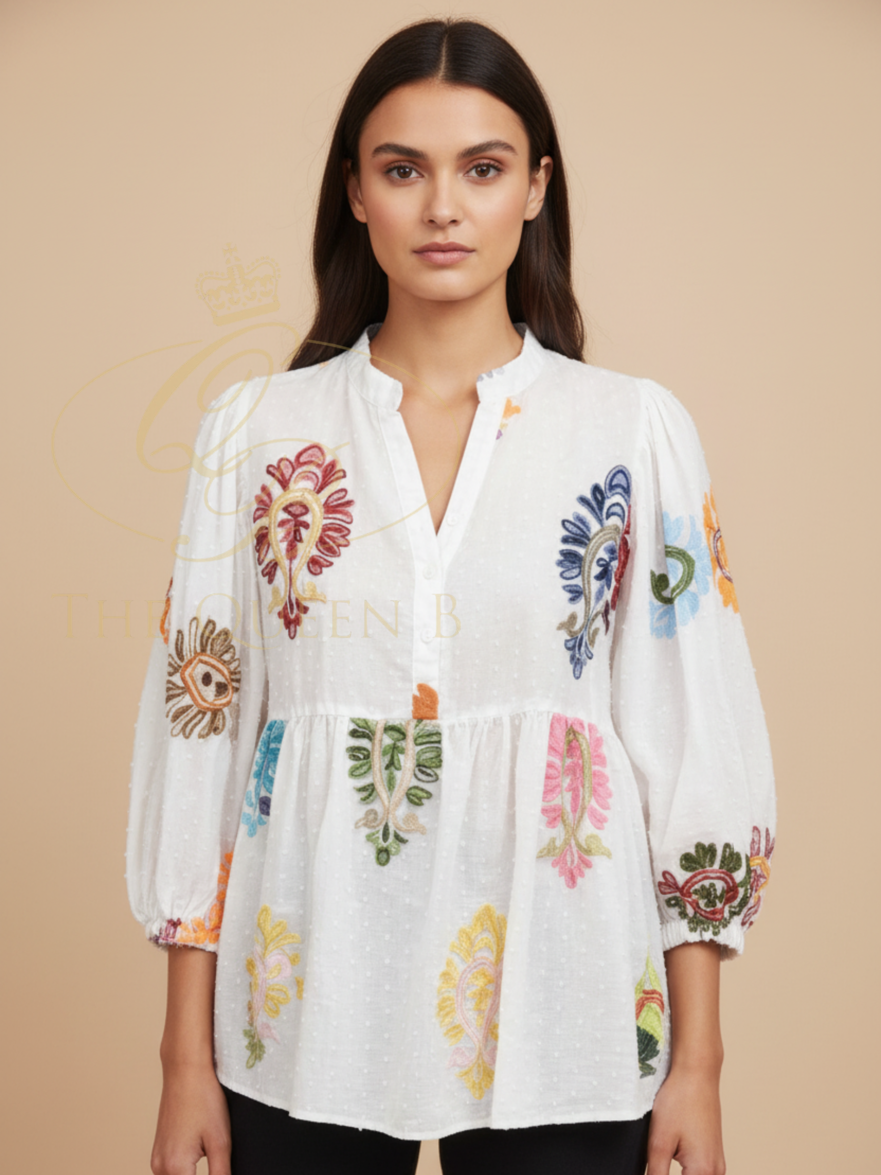 Malissa J WF2832 Woven Voluminous Sleeve Shirt with notch neckline, gathered waist seam, voluminous sleeves and colourful embroidered motif detailing throughout.
