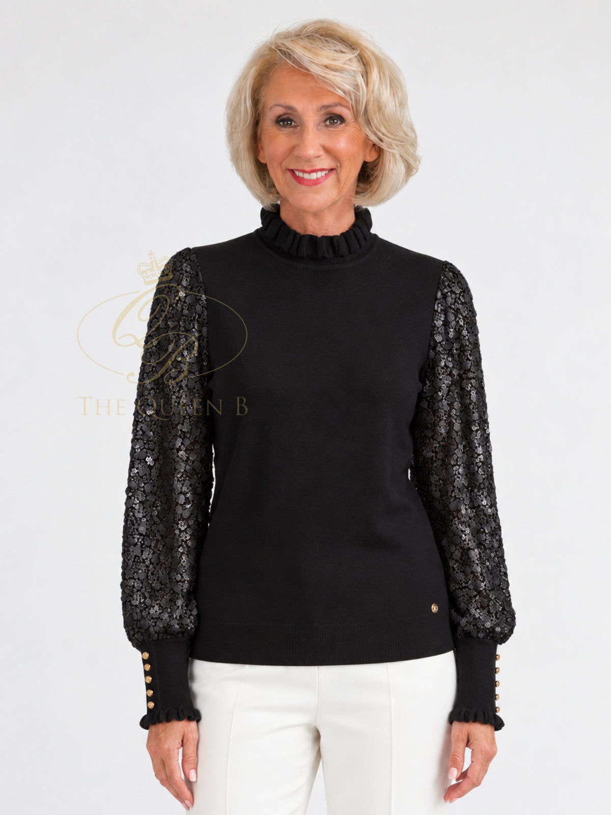 Micha 103 Jumper with sequin long sleeves, high frill neckline, ribbed cuffs and decorative button detailing.