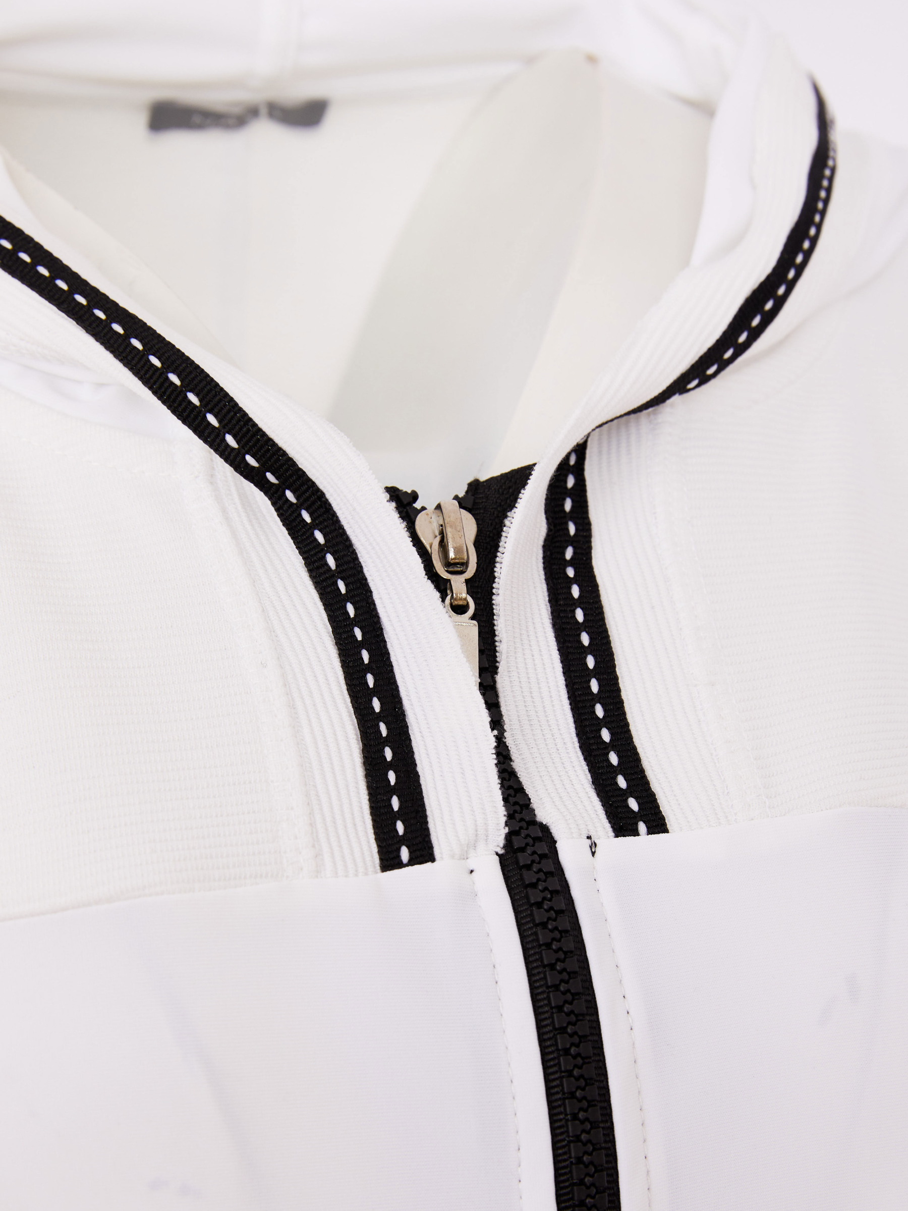 Naya NAS26 171 High Neck Zip Top featuring zip-front fastening, high neckline and contrast fabric detailing.