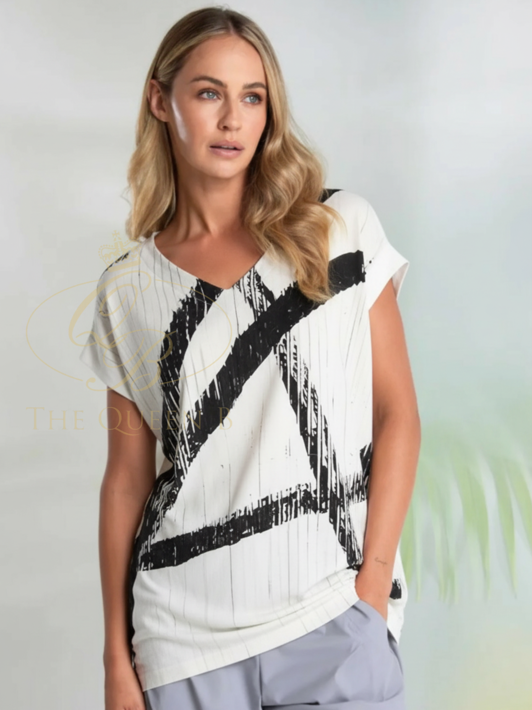 Naya NAS26 319 brush stroke V-neck top with relaxed fit and contemporary silhouette.