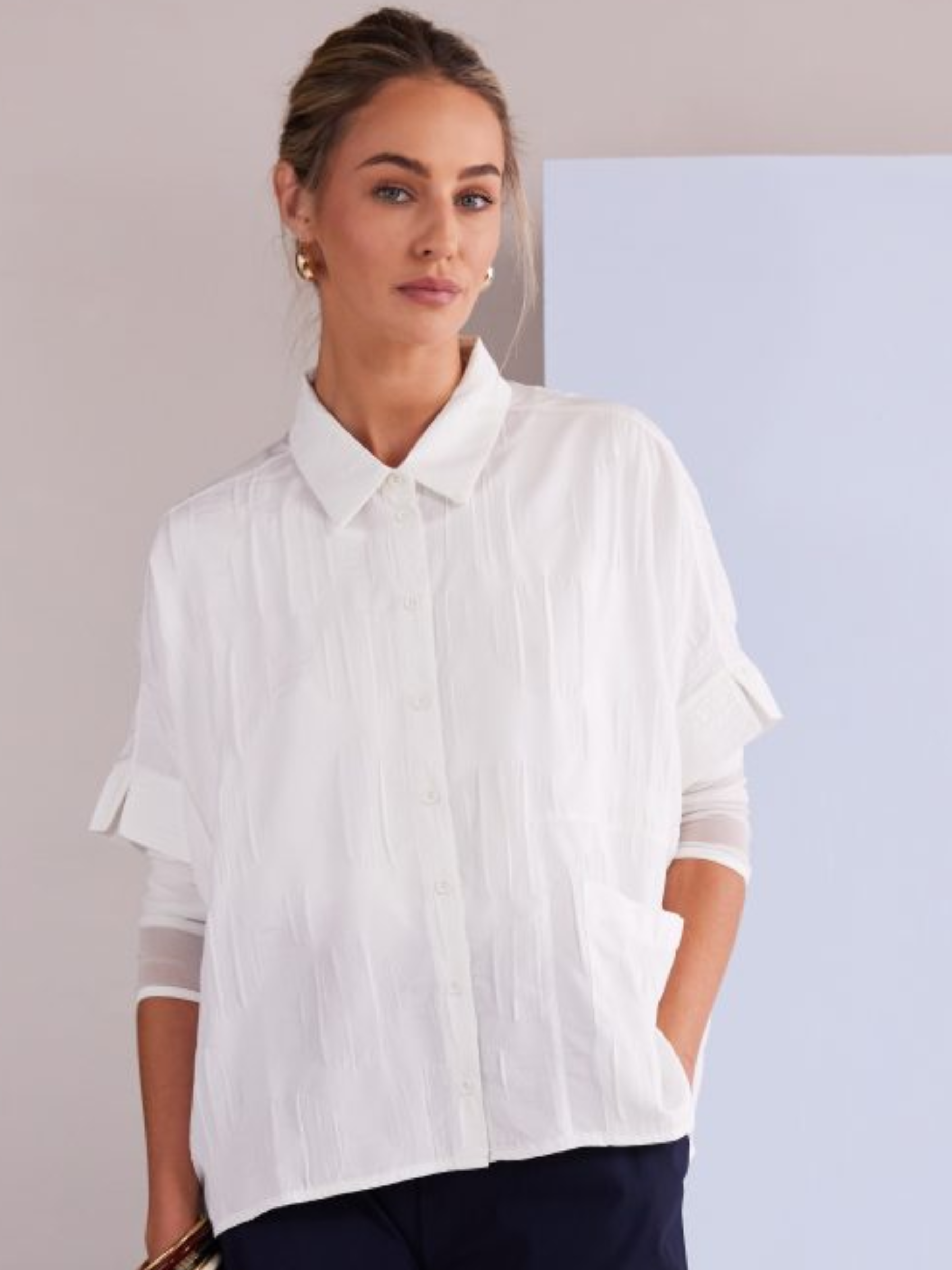 Naya NPA26 111 Front Pocket Short Blouse with collared neckline, button front, short sleeves and textured finish