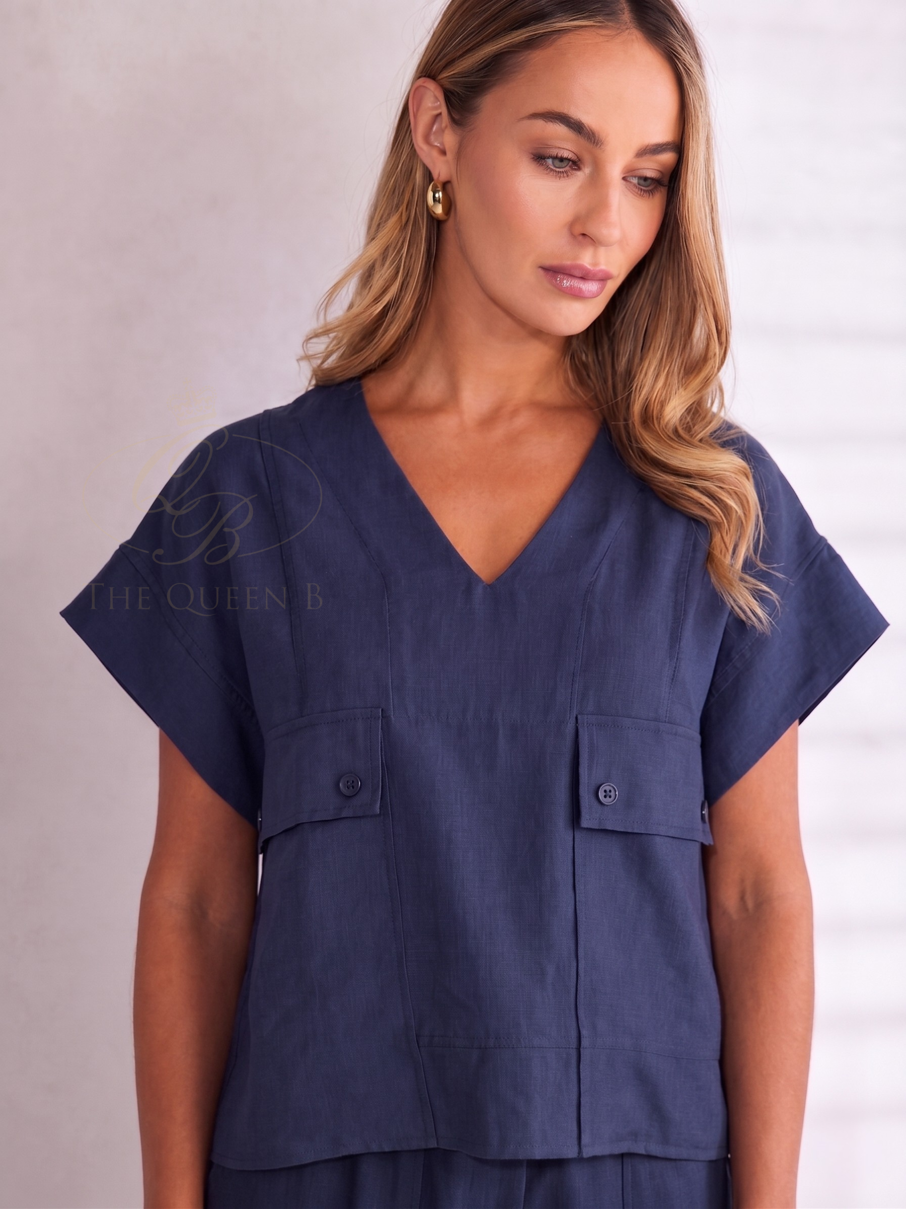 Naya NPA26 220 V-Neck Top with short sleeves, front pocket detail, button accents and relaxed fit