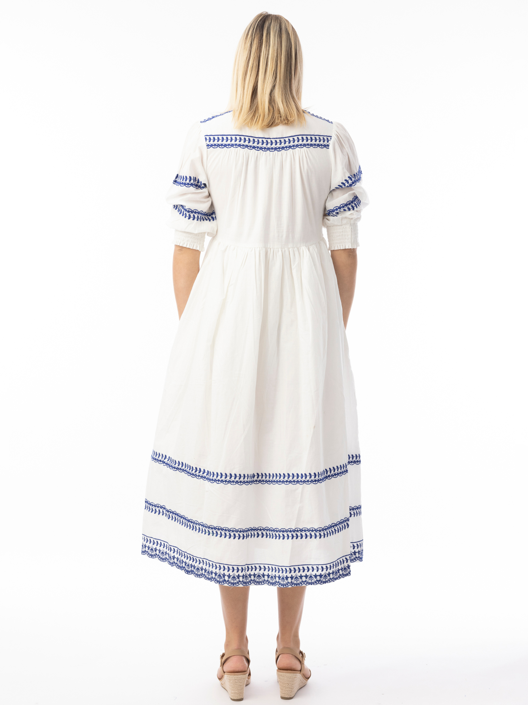 Orientique 30220 Embroidered Essentials Dress white cotton midi dress with blue embroidery, V-notch neckline and three-quarter sleeves.