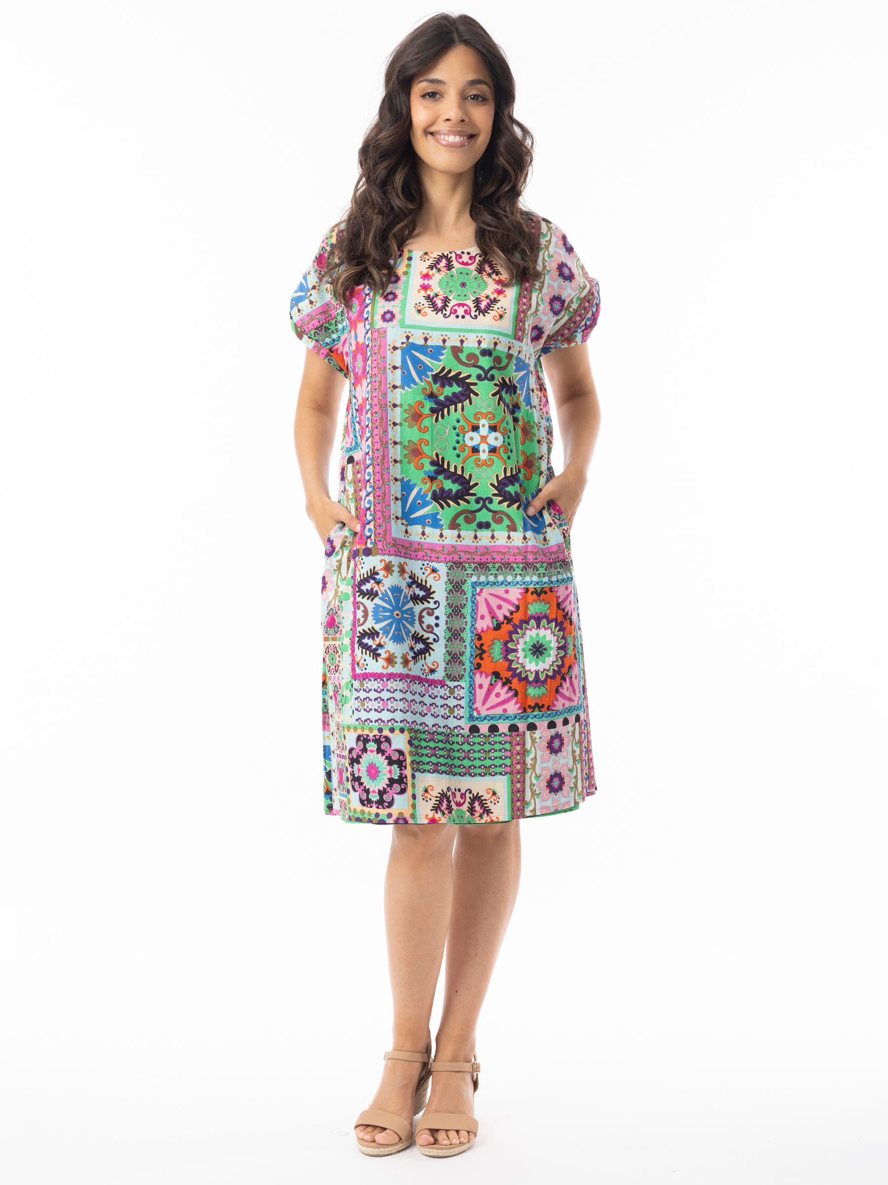 Orientique 61736 Sao Bento Dress, reversible knee-length shift dress with short sleeves and a round neckline, shown in two different prints.