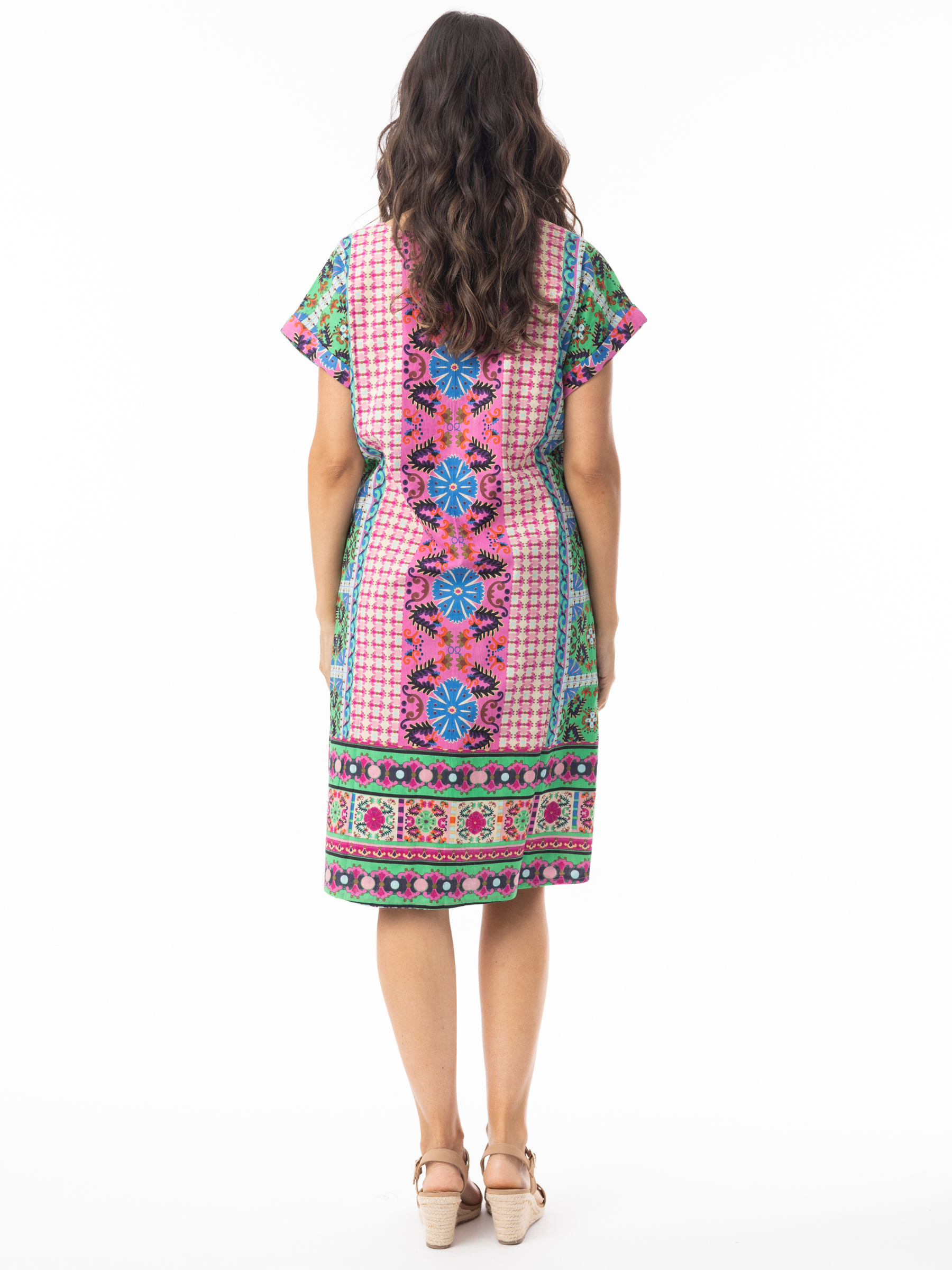 Orientique 61736 Sao Bento Dress, reversible knee-length shift dress with short sleeves and a round neckline, shown in two different prints.