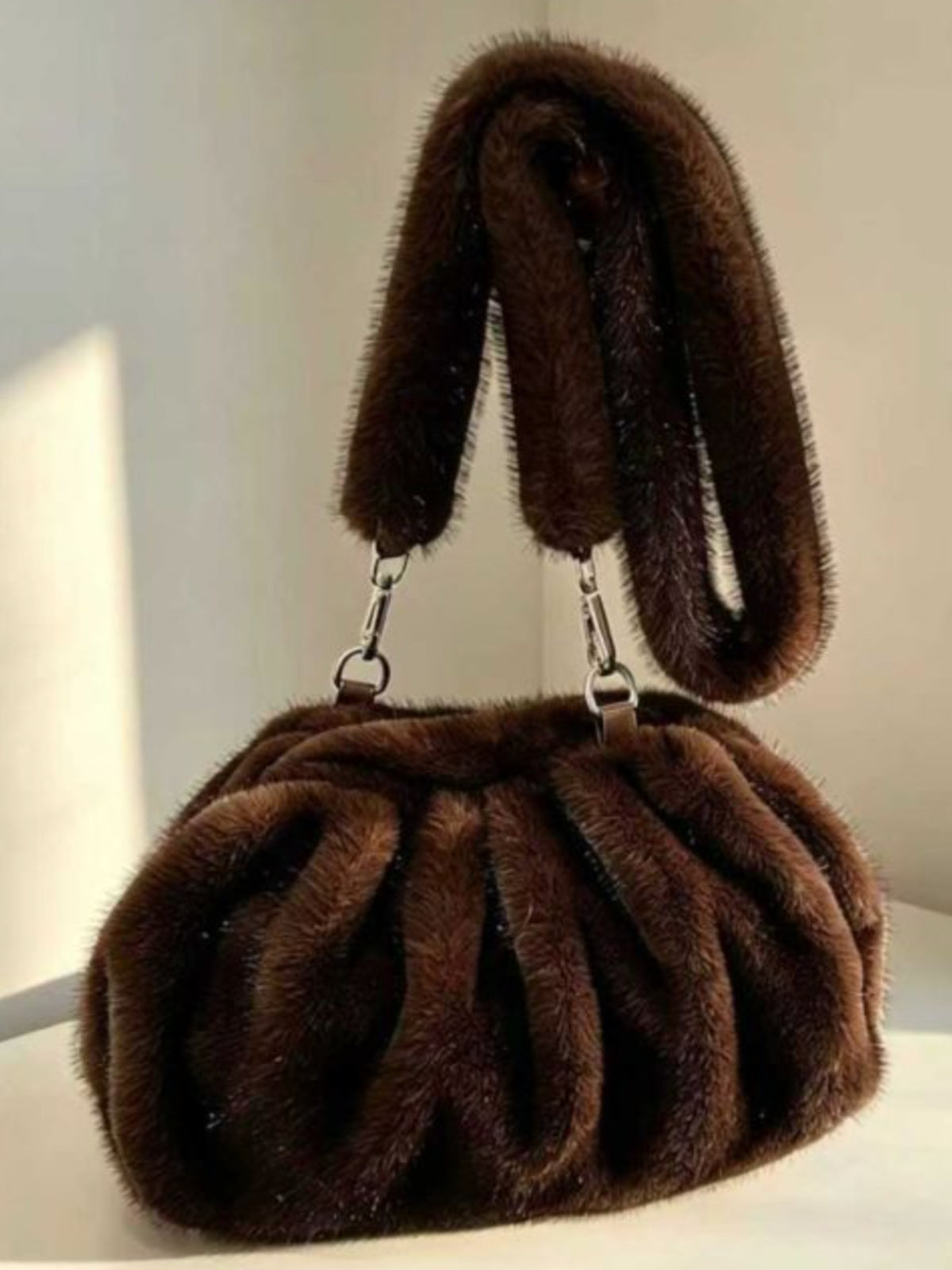 PCHA 60402 Faux Fur Ruched Handbag with gathered design, plush textured finish and matching shoulder strap.