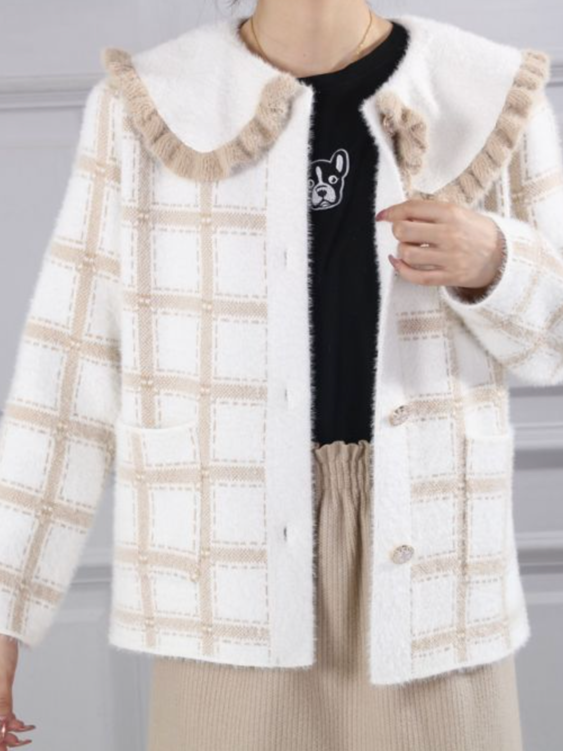 PCHA CA216 Ruffle Collar Plaid Cardigan with plaid pattern, oversized ruffle-trim collar and button-front fastening.