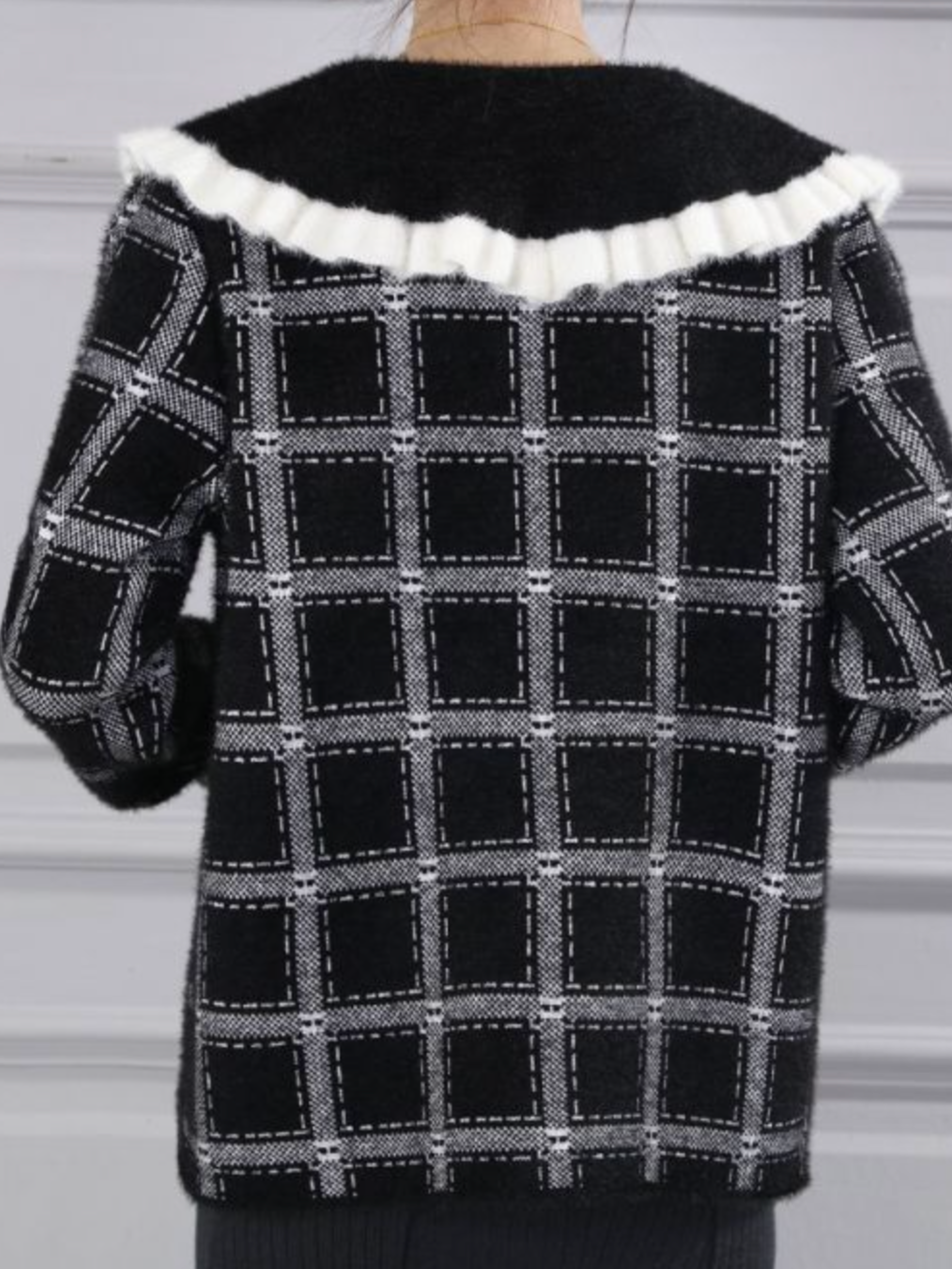 PCHA CA216 Ruffle Collar Plaid Cardigan with plaid pattern, oversized ruffle-trim collar and button-front fastening.