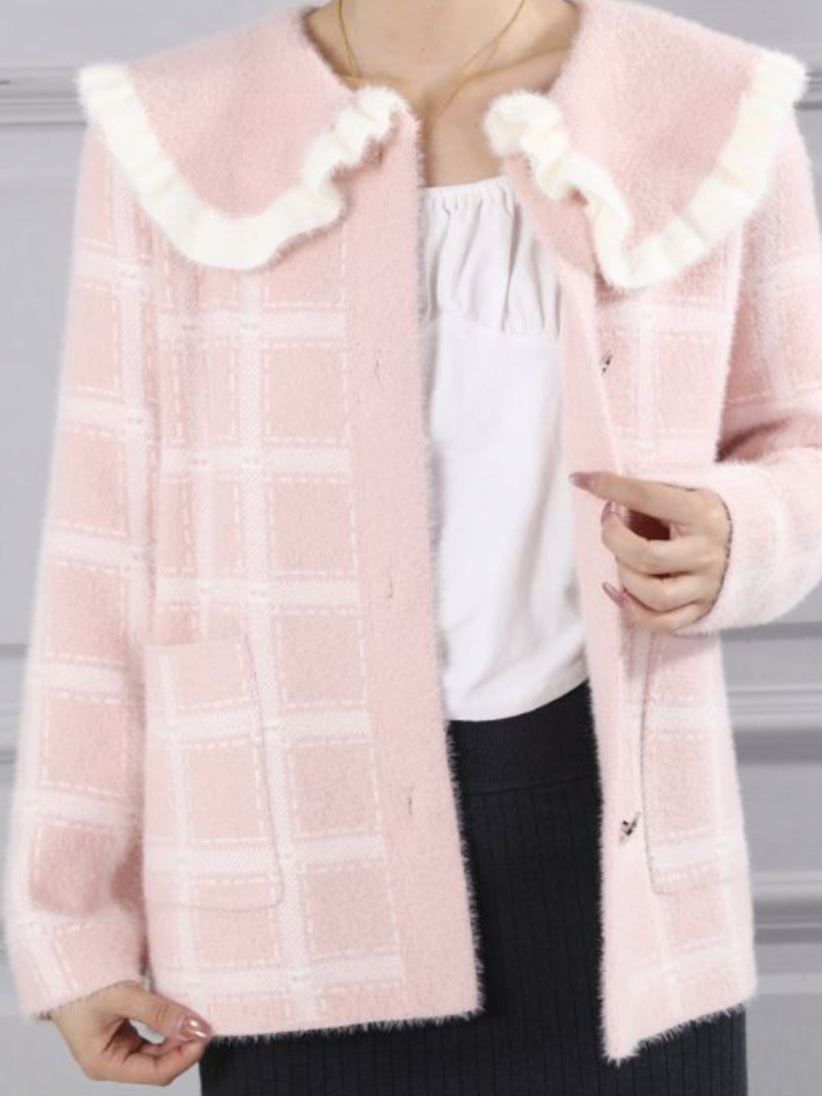 PCHA CA216 Ruffle Collar Plaid Cardigan with plaid pattern, oversized ruffle-trim collar and button-front fastening.