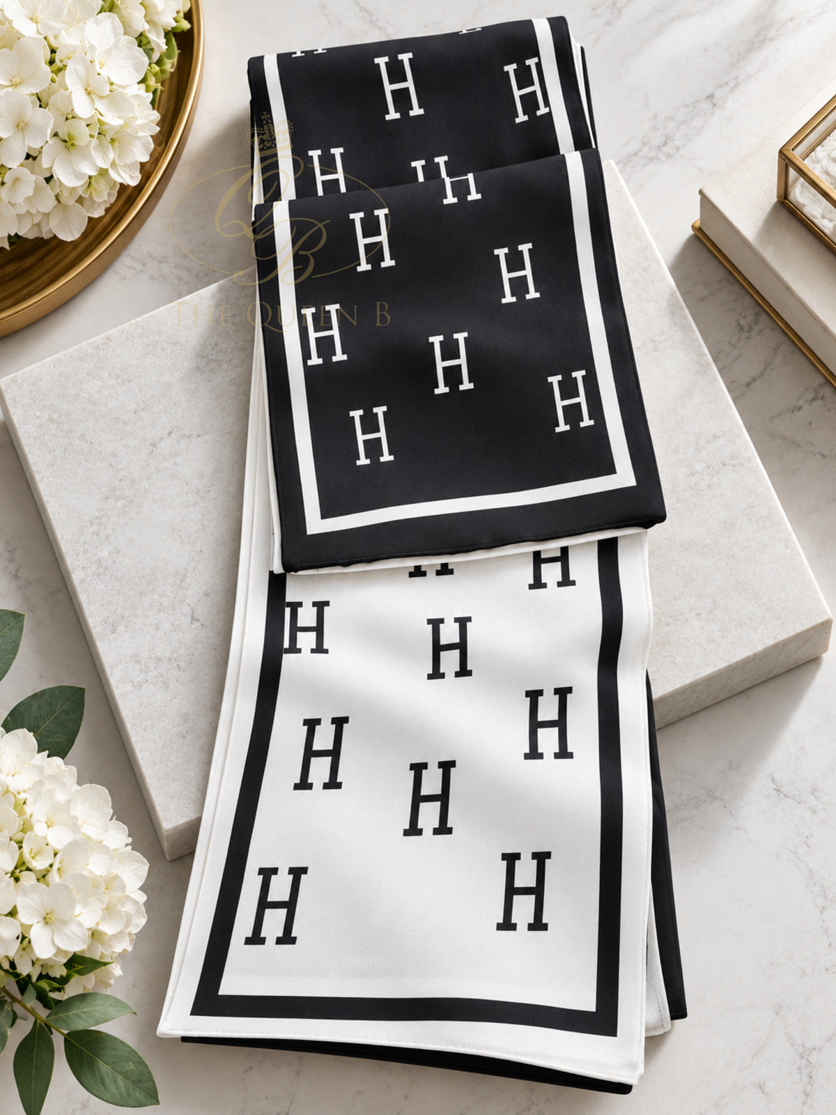 PCHA F816 Monogram Scarf with repeated letter H pattern and contrasting border.