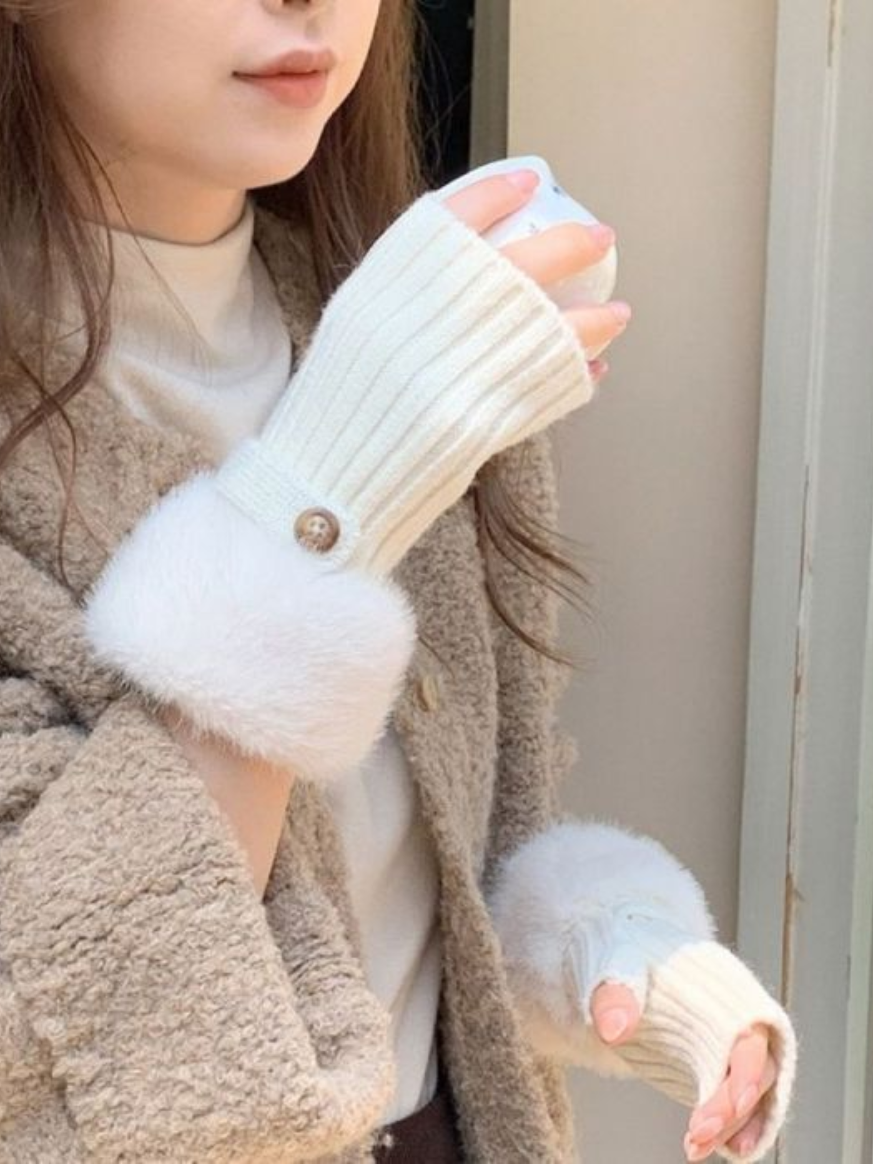 PCHA HA316 Cream Faux Fur Knit Fingerless Button Gloves featuring ribbed knit, faux fur cuffs and button detail — a cosy winter accessory also available in black and burgundy.