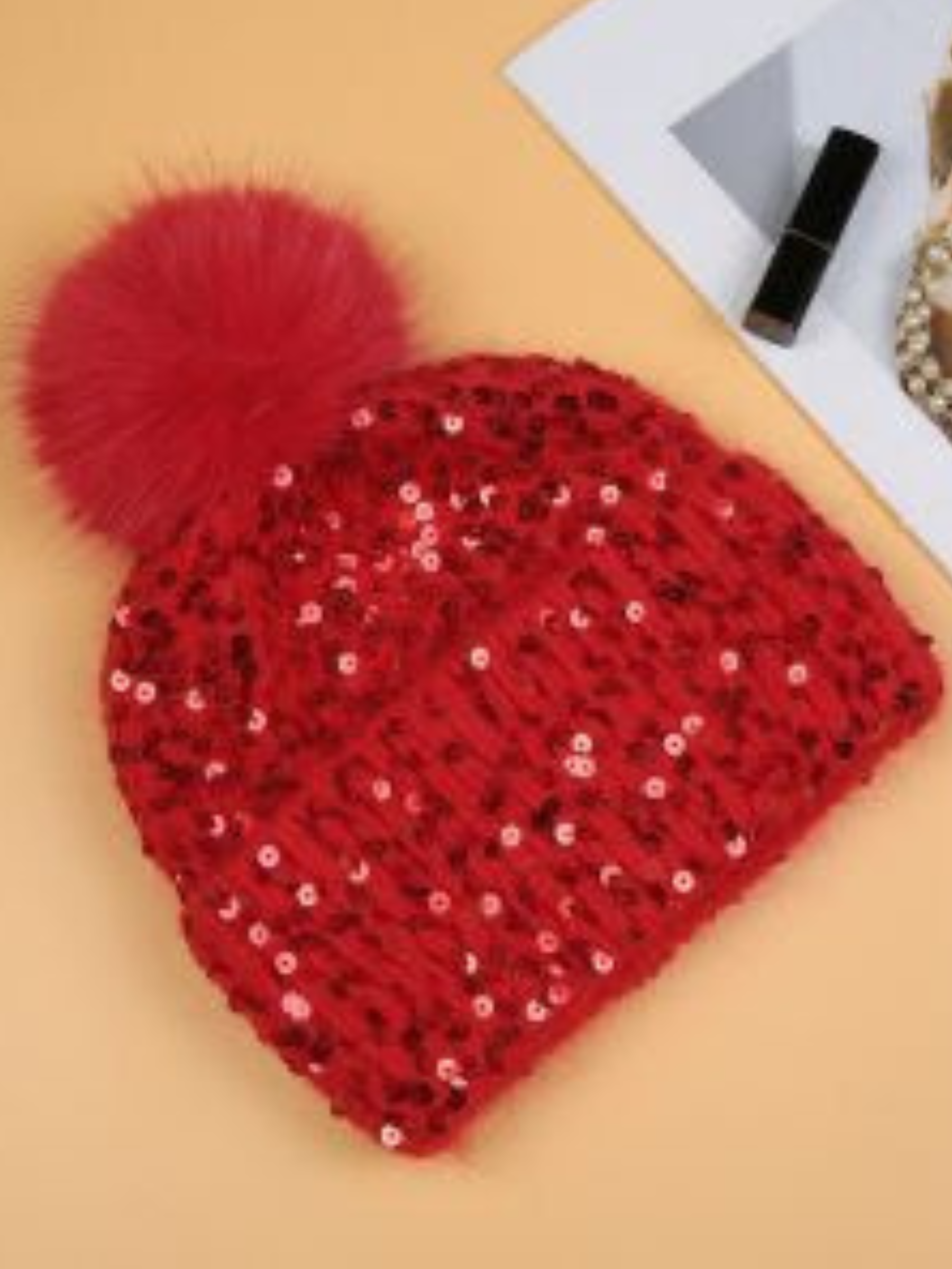 PCHA SD117 Red Sequin Pompom Hat – red sequin-embellished knit hat with faux fur pompom, also available in black and cream. Perfect for winter and festive styling.