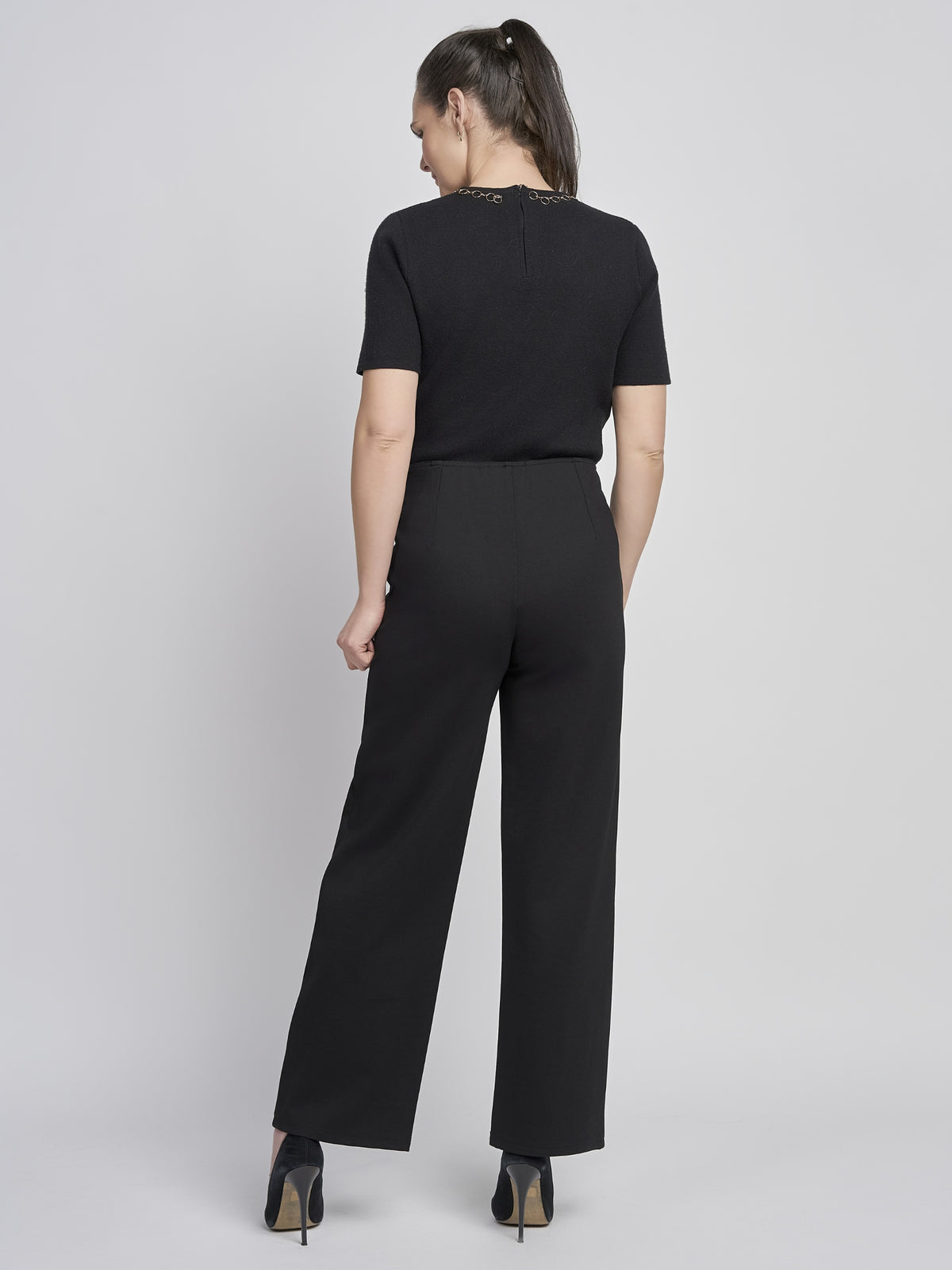 PINNS 610T Wide Leg Trousers with high-rise waist, decorative front buttons and full-length wide leg silhouette.