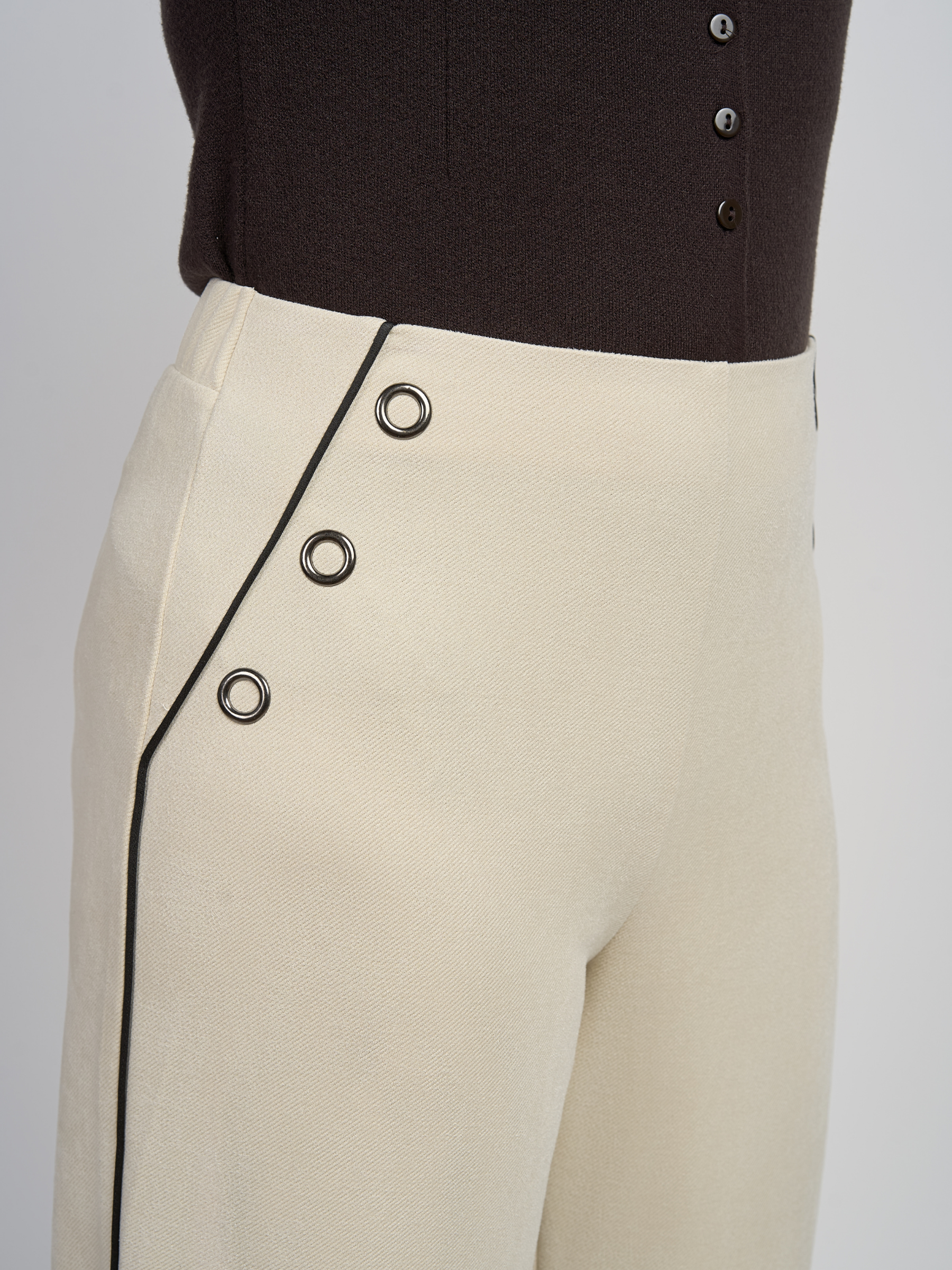 PINNS 778T super soft wide leg trousers with contrast piping detail, eyelet trim and a flattering wide leg fit.