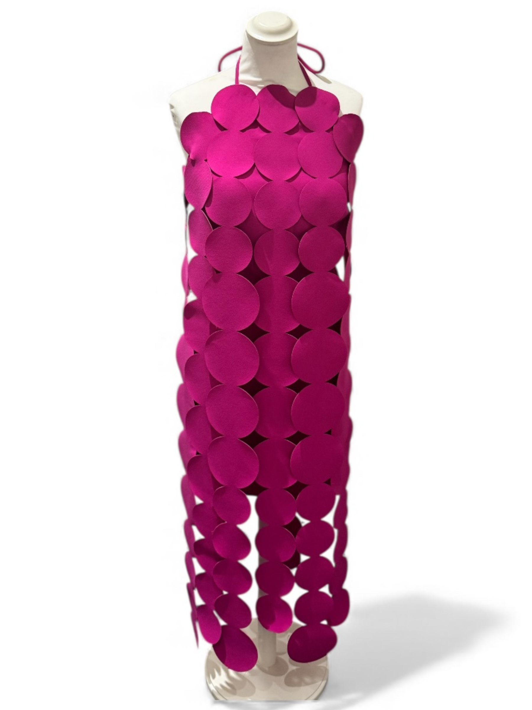 Fuchsia circular appliqué yacht dress with halter neckline, bold statement style for events and parties.