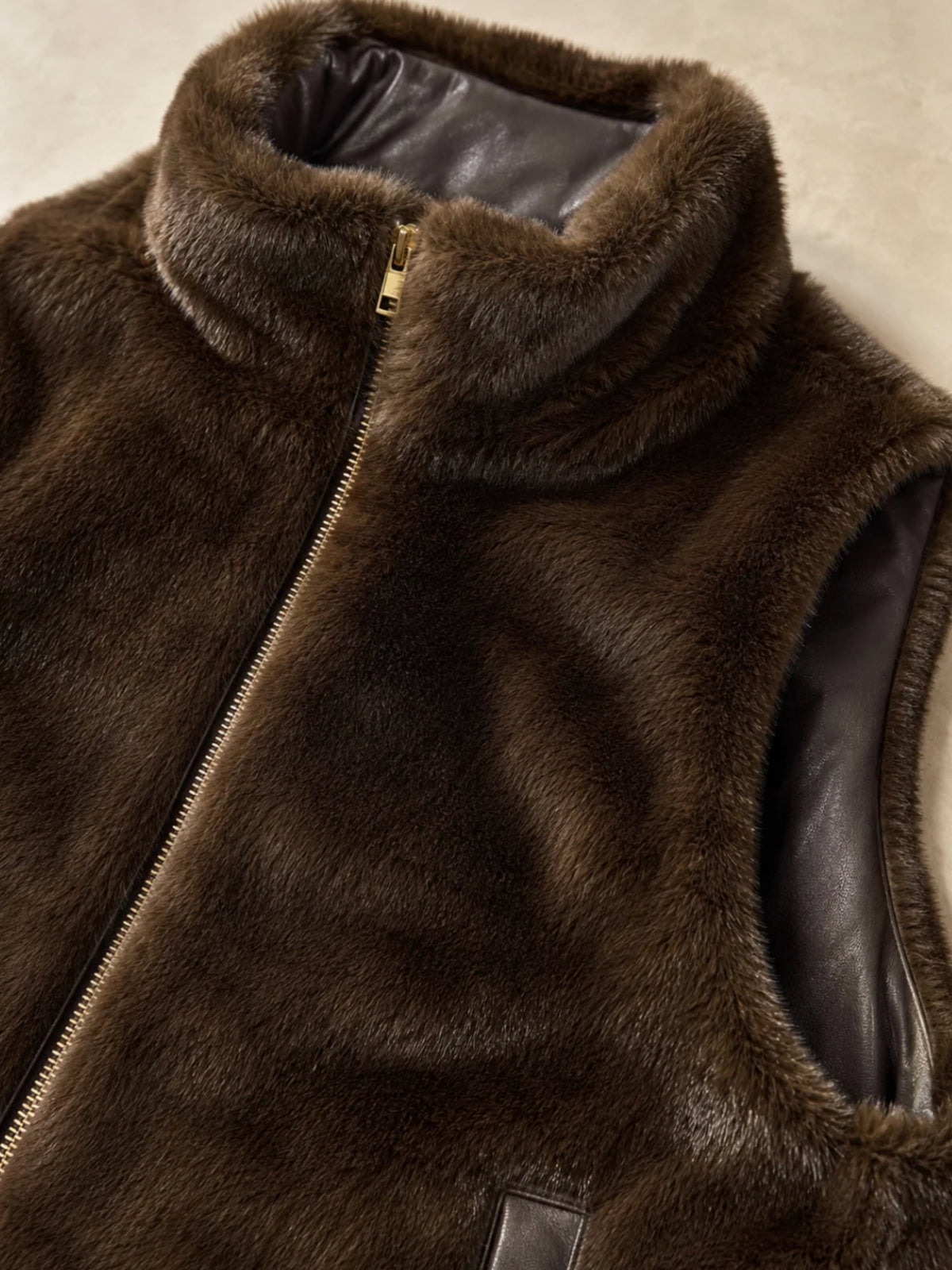 QBAW26 CW Elizabeth Reversible Long Gilet with smooth outer finish, soft textured reverse, high neckline and zip fastening.
