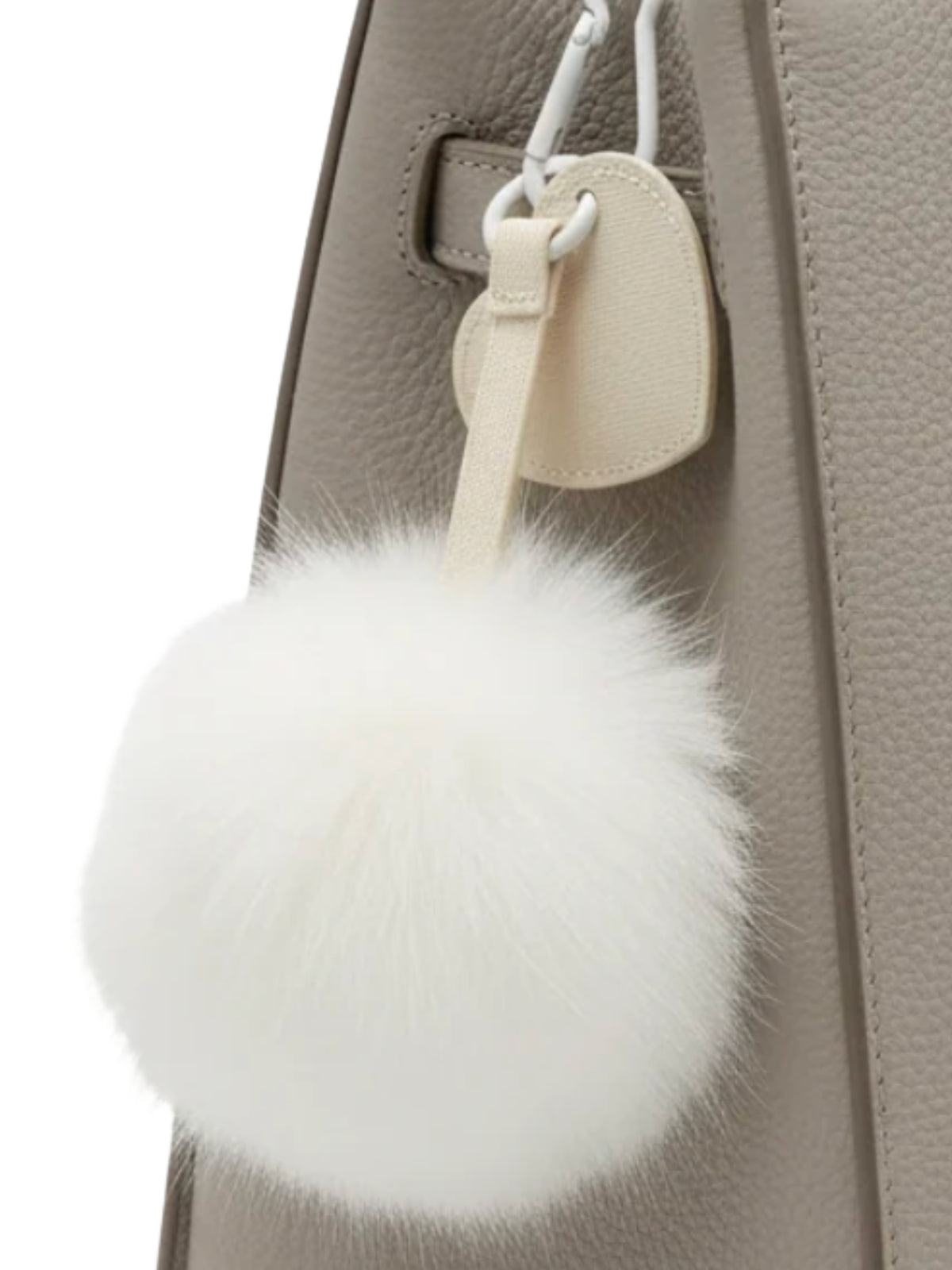 QBAW26 CW Emma Pom Pom Key Chain with soft fluffy pom pom and loop attachment.