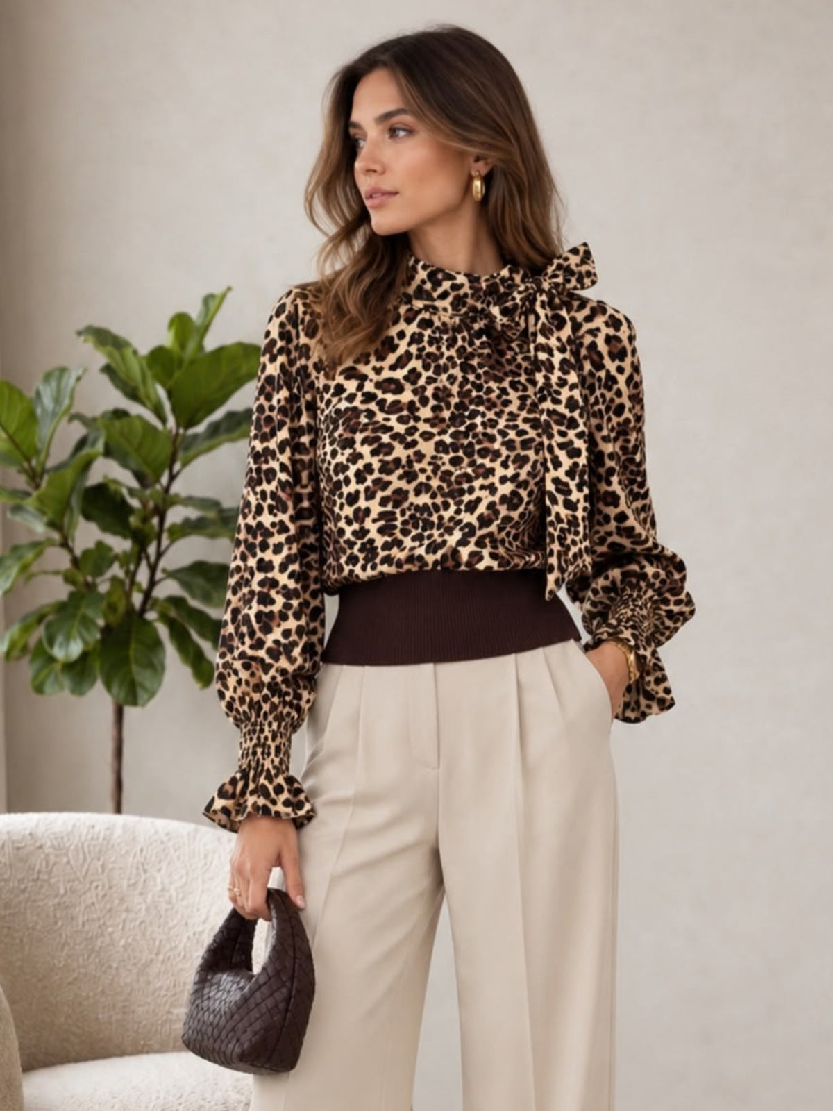 QBAW26 LX Amy Bow Detailed Leopard Print Top with bow neckline, balloon sleeves, frill cuffs and contrast ribbed back.