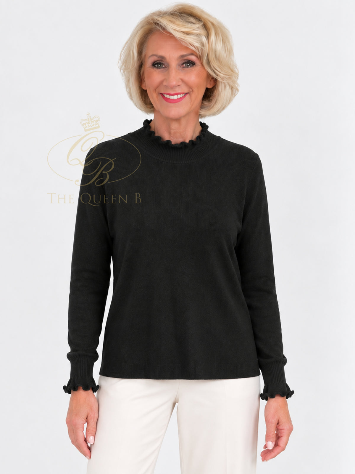 QBAW26 LX Florence Jumper with high ruffle neckline, long sleeves and ribbed cuffs with matching ruffle trim.