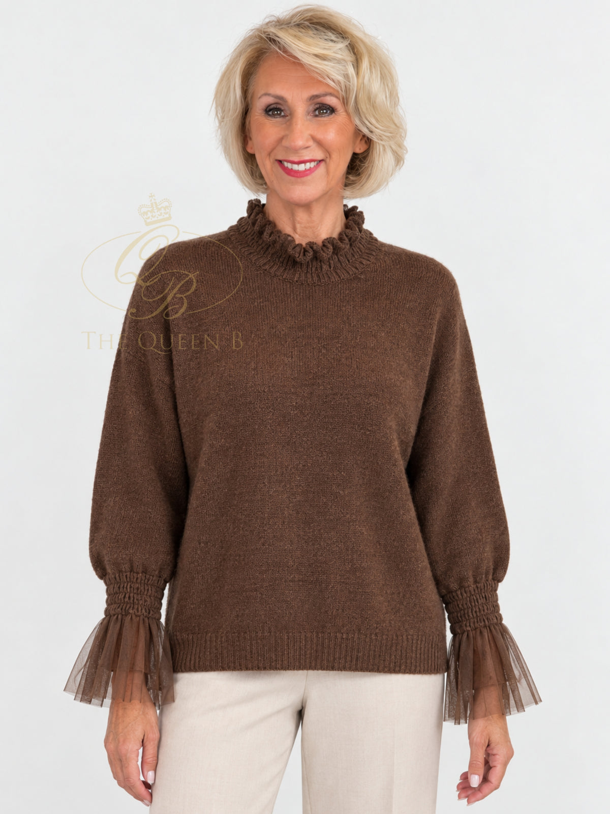 QBAW26 LX Poppy Jumper with ruffle high neckline, long balloon sleeves, sheer ruffle cuffs and ribbed hem.