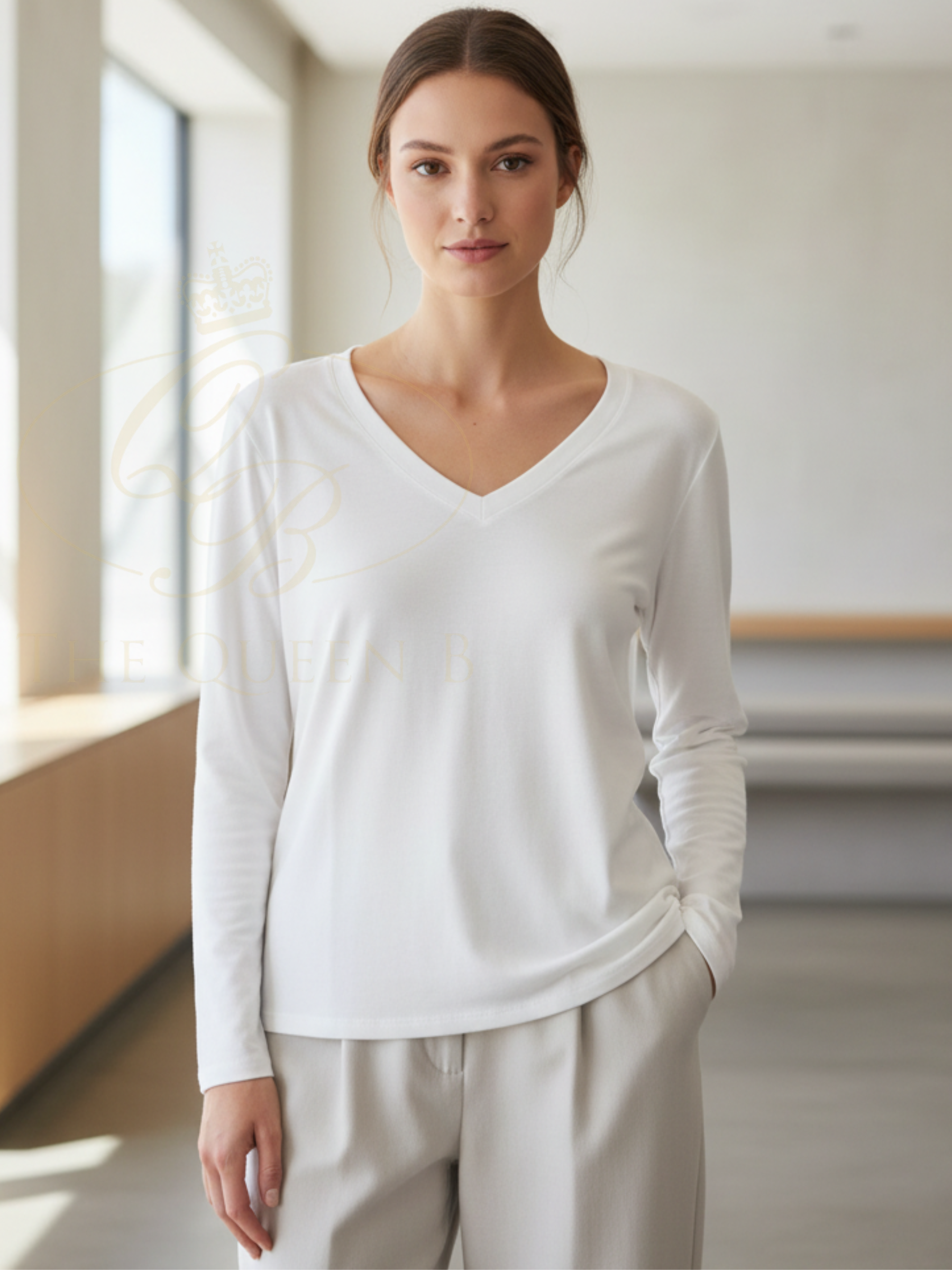 QBSS26 EV Gemma Long Sleeve V Neck Top with fleece-lined interior, stretch fabric and flattering V-neck silhouette.