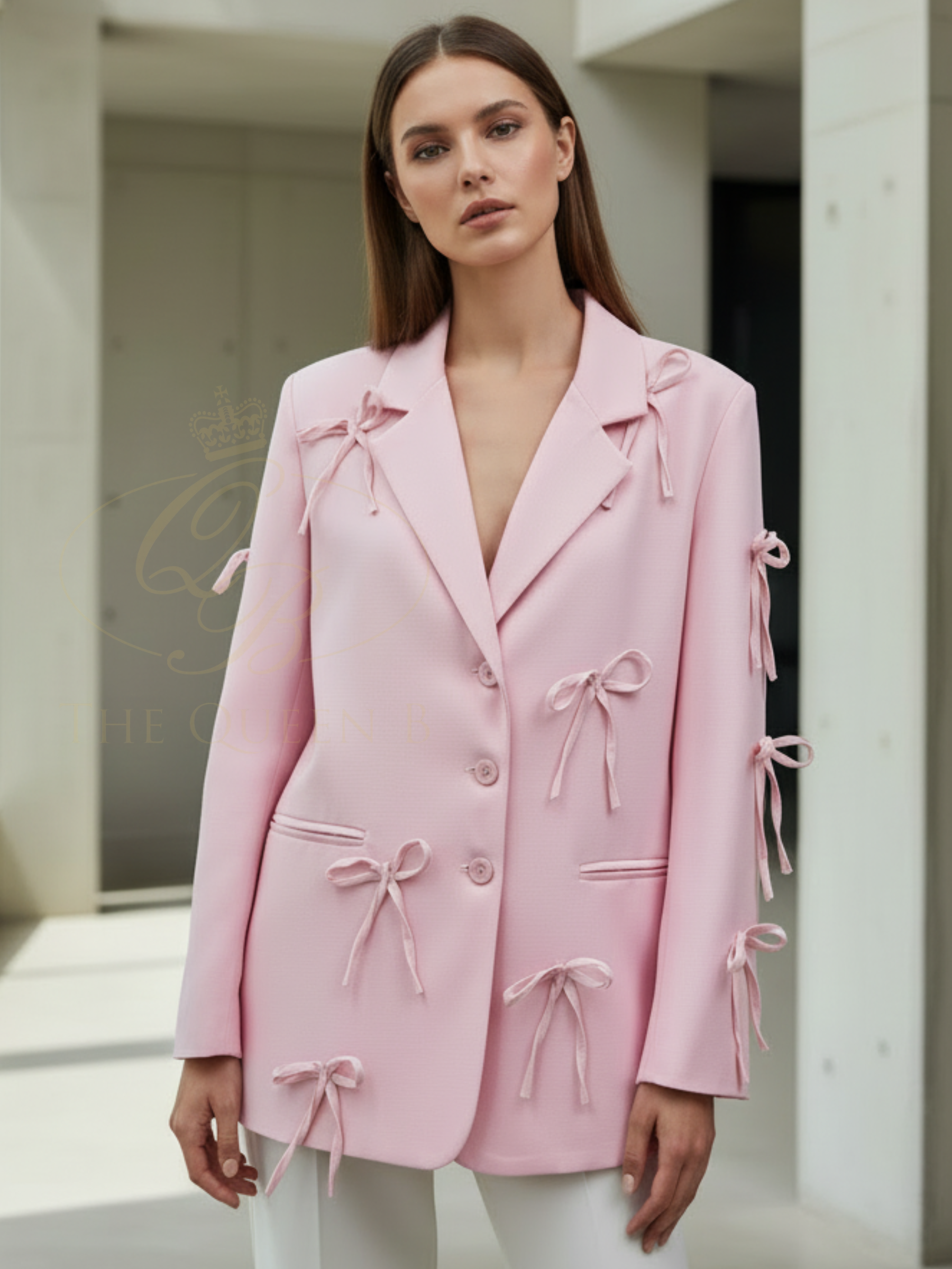 QBSS26 UA Jasmine Bow Blazer with tailored silhouette, bow detailing and classic lapel neckline, styled for an elegant finish.