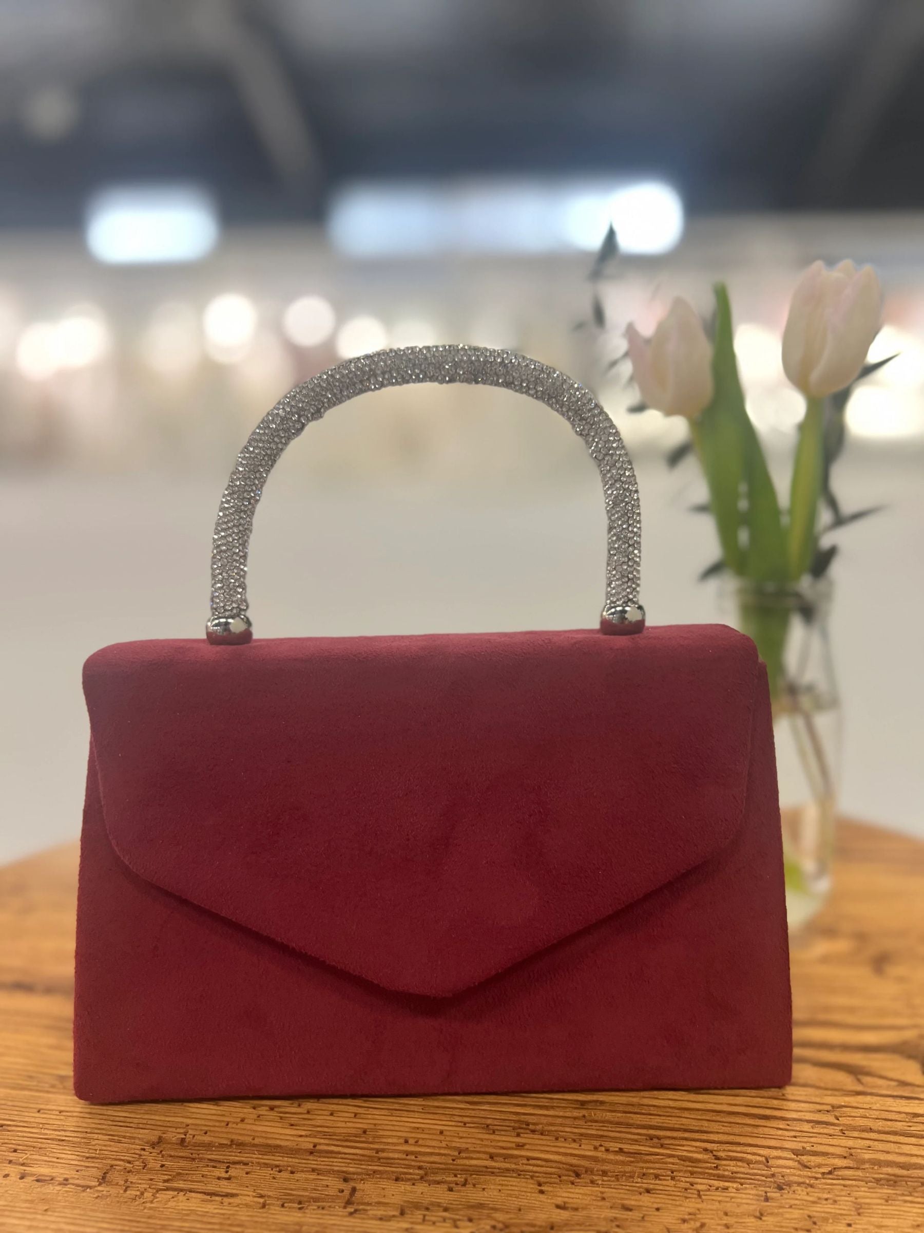 Burgundy structured handbag with sparkling rhinestone handle - elegant women’s evening bag for weddings, parties and chic occasionwear.
