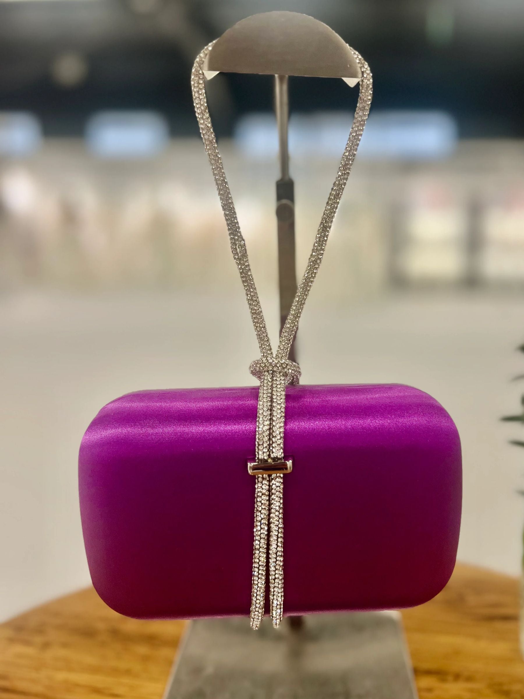 Purple satin evening clutch with sparkling rhinestone strap - elegant women’s occasion bag for weddings, parties and special events.
