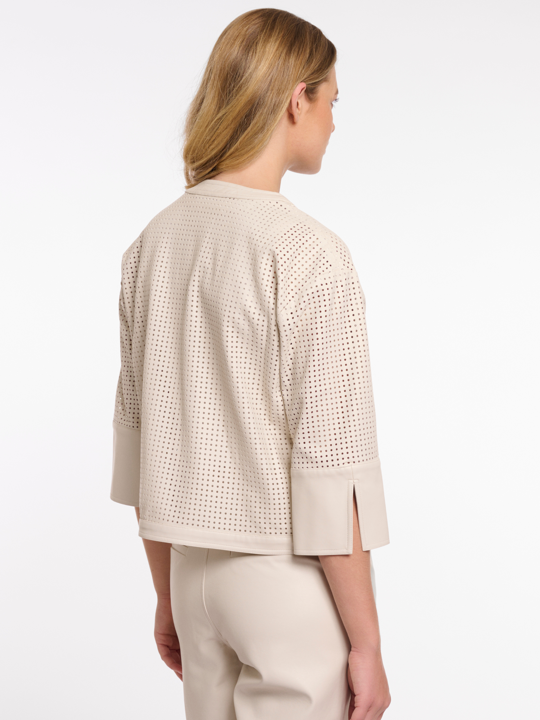 Rino & Pelle Abou Jacket with perforated faux leather design, cropped structured silhouette and modern button front.
