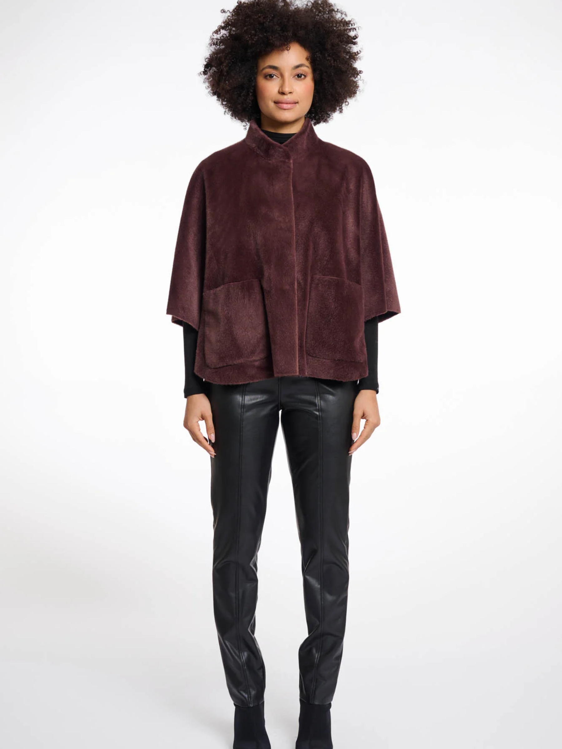 Rino & Pelle Faux-Fur Cape in plush soft finish with snap button closure, pockets and side slit details – elegant women’s evening and winter cape.