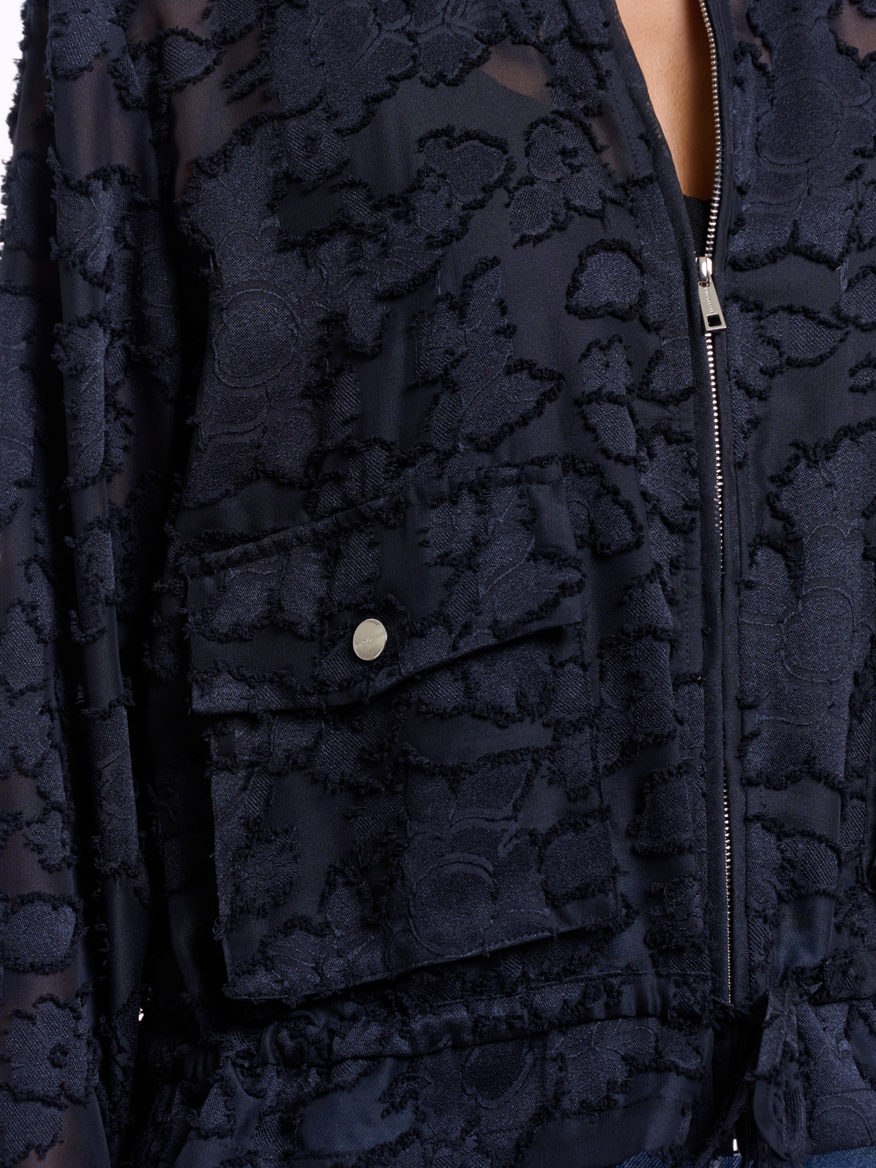Rino & Pelle Priori Jacket lightweight printed zip jacket with patch pockets and drawstring hem.